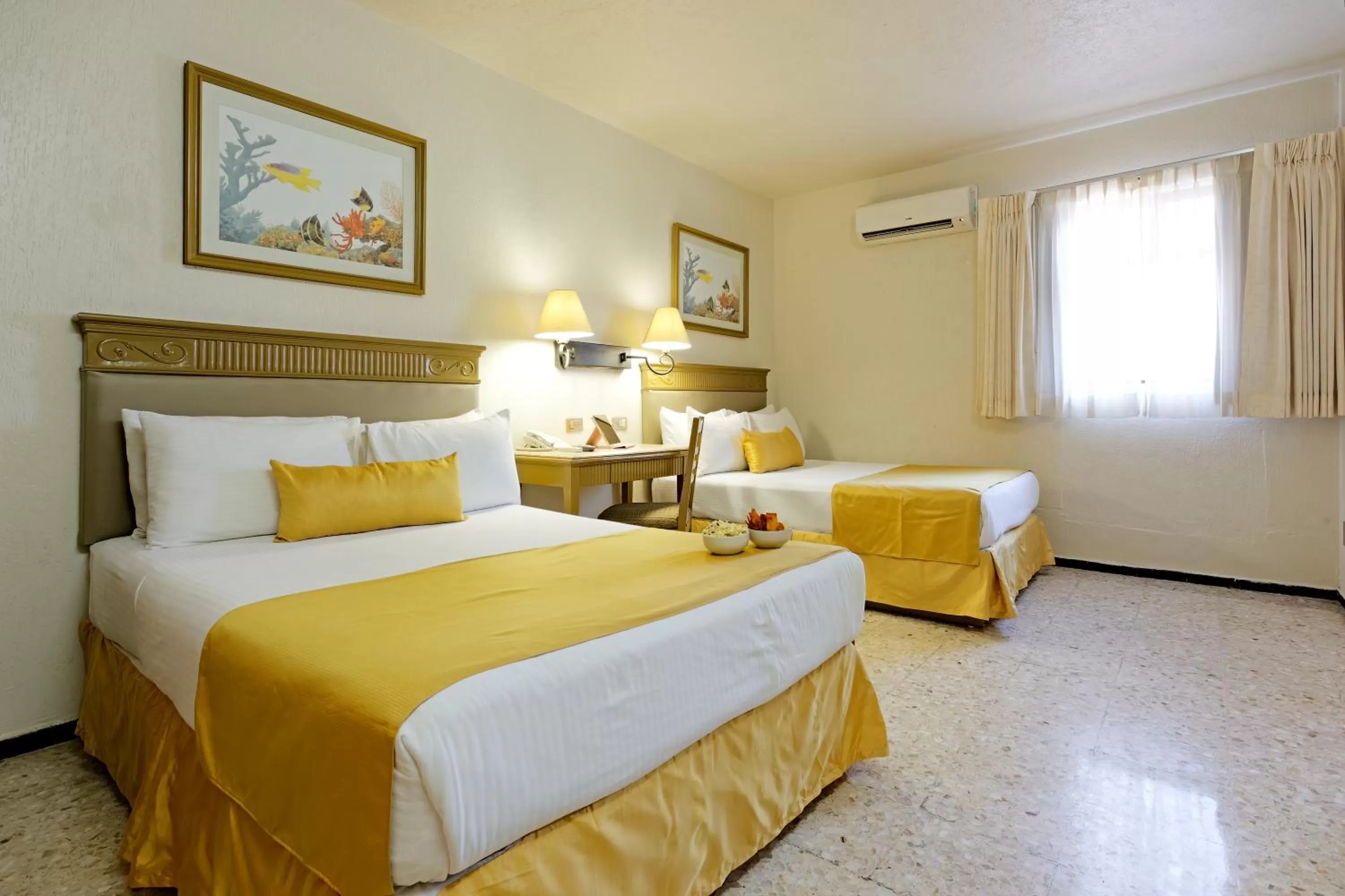 Bed in Hotel Olmeca Plaza