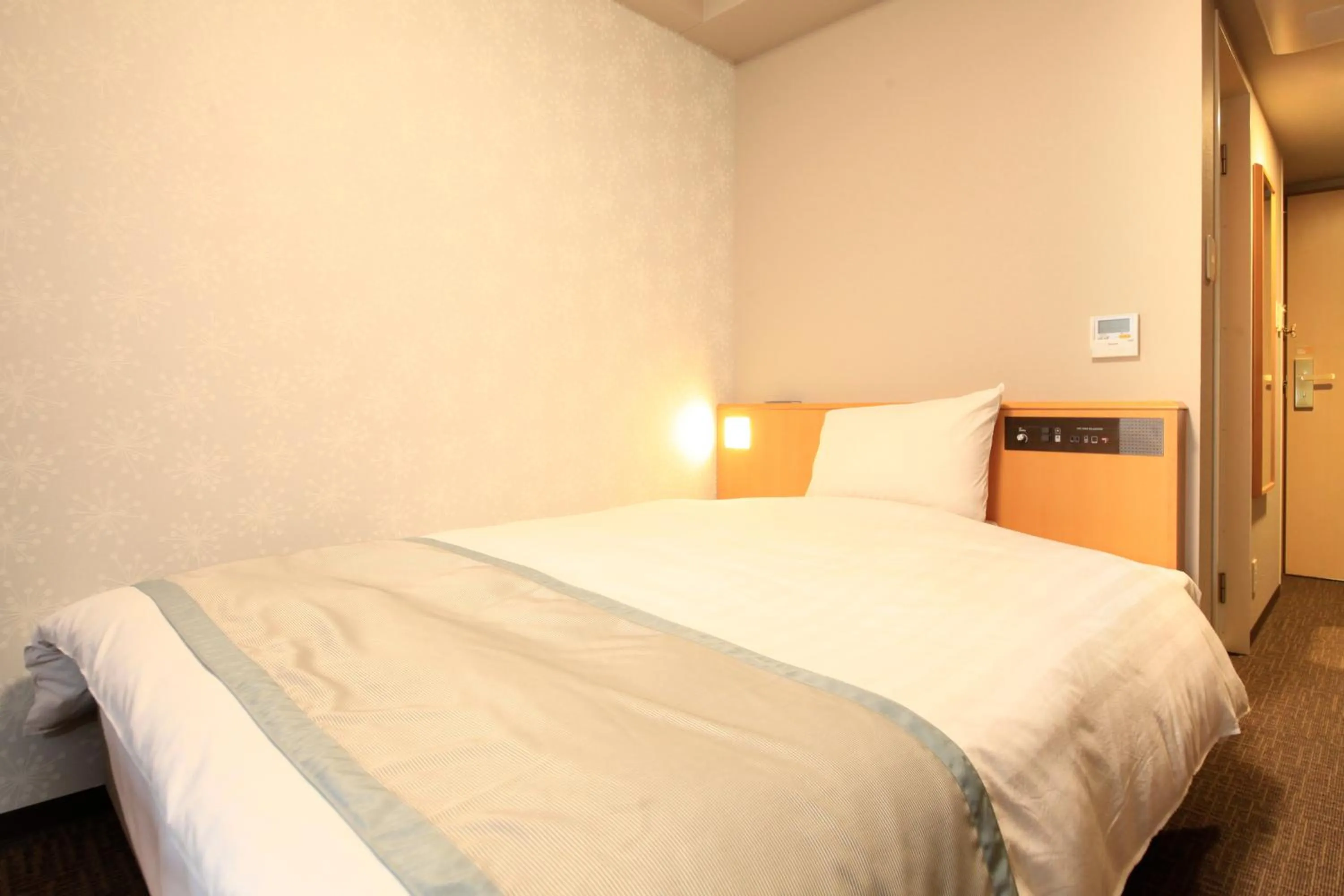 Photo of the whole room, Bed in Richmond Hotel Sapporo Ekimae