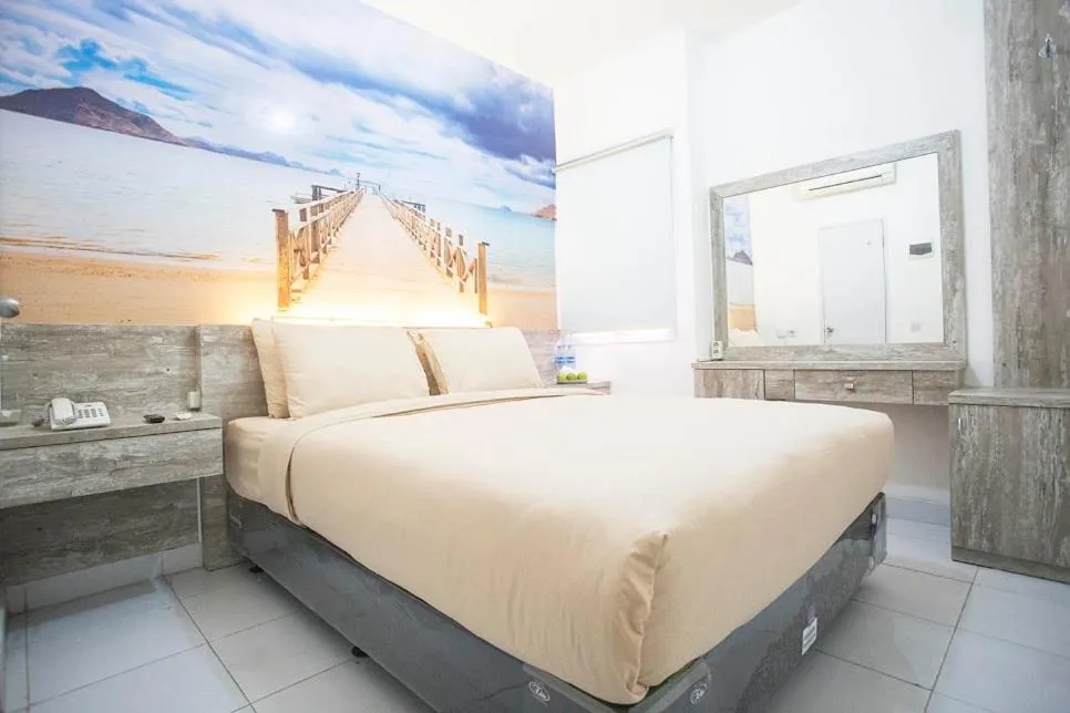 Bed in De Green Inn at Aeropolis