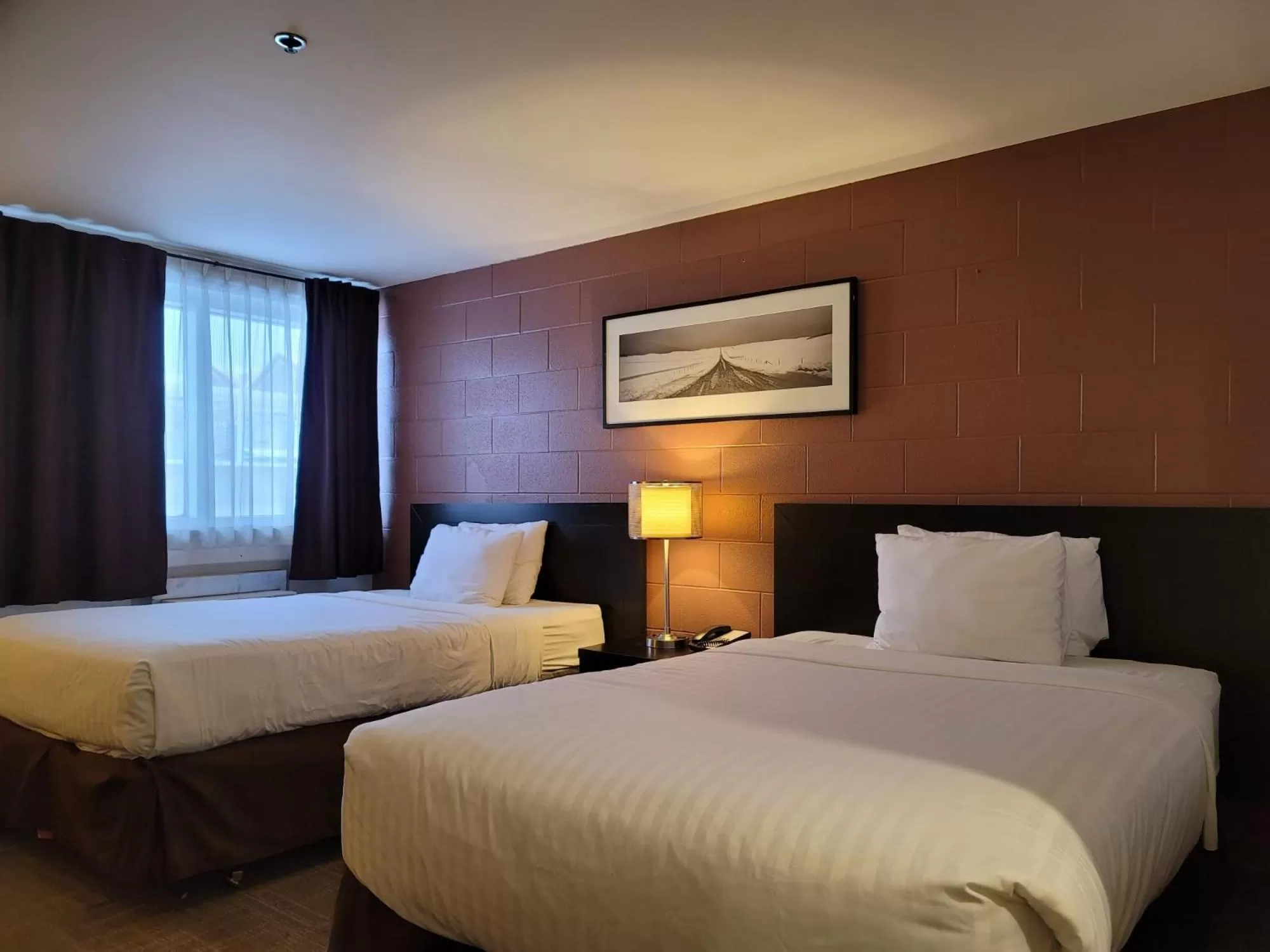 Bed in Roadking Inns Motel