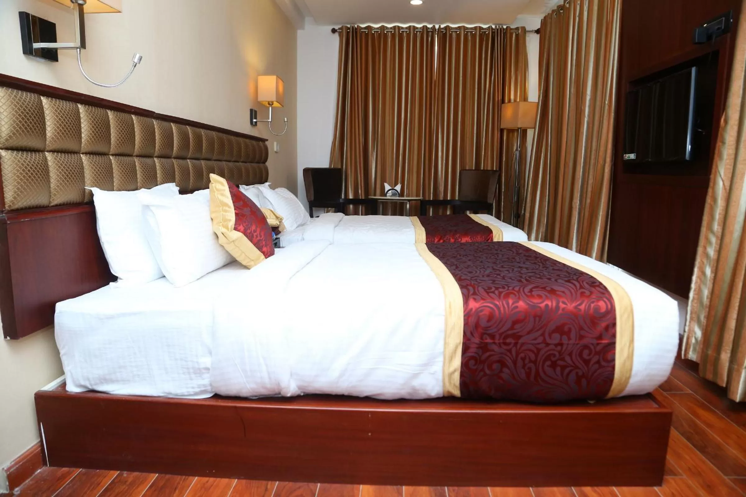 Bed in Raaj Bhaavan Clarks Inn Chennai