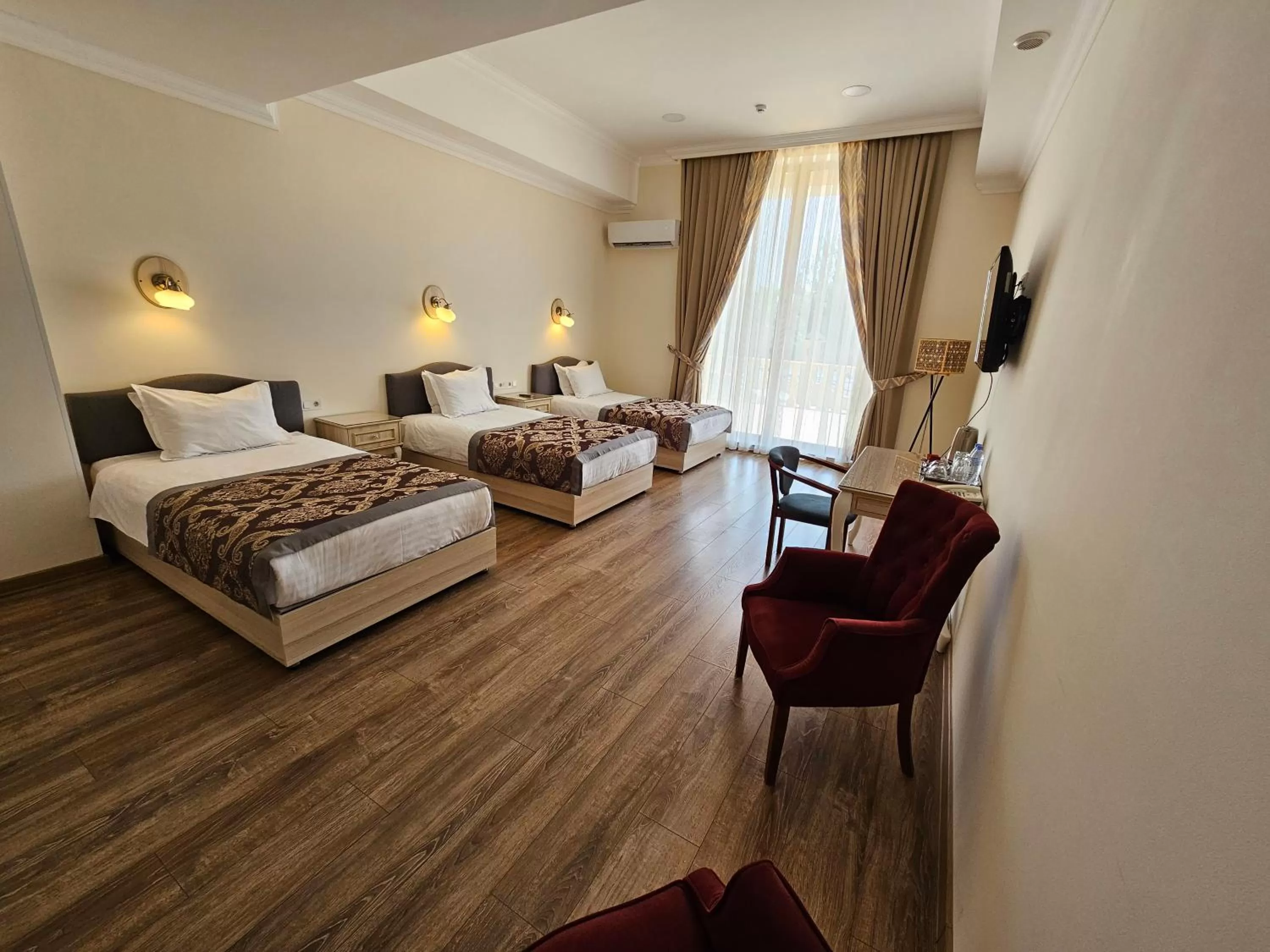 Bed in Silk Road Kokand Hotel