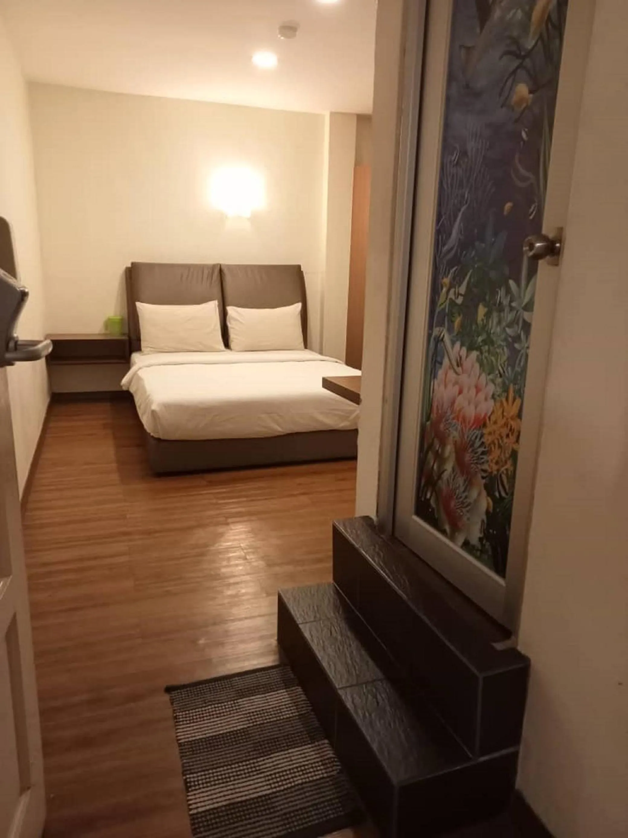 Bed in I Harmony Hotel