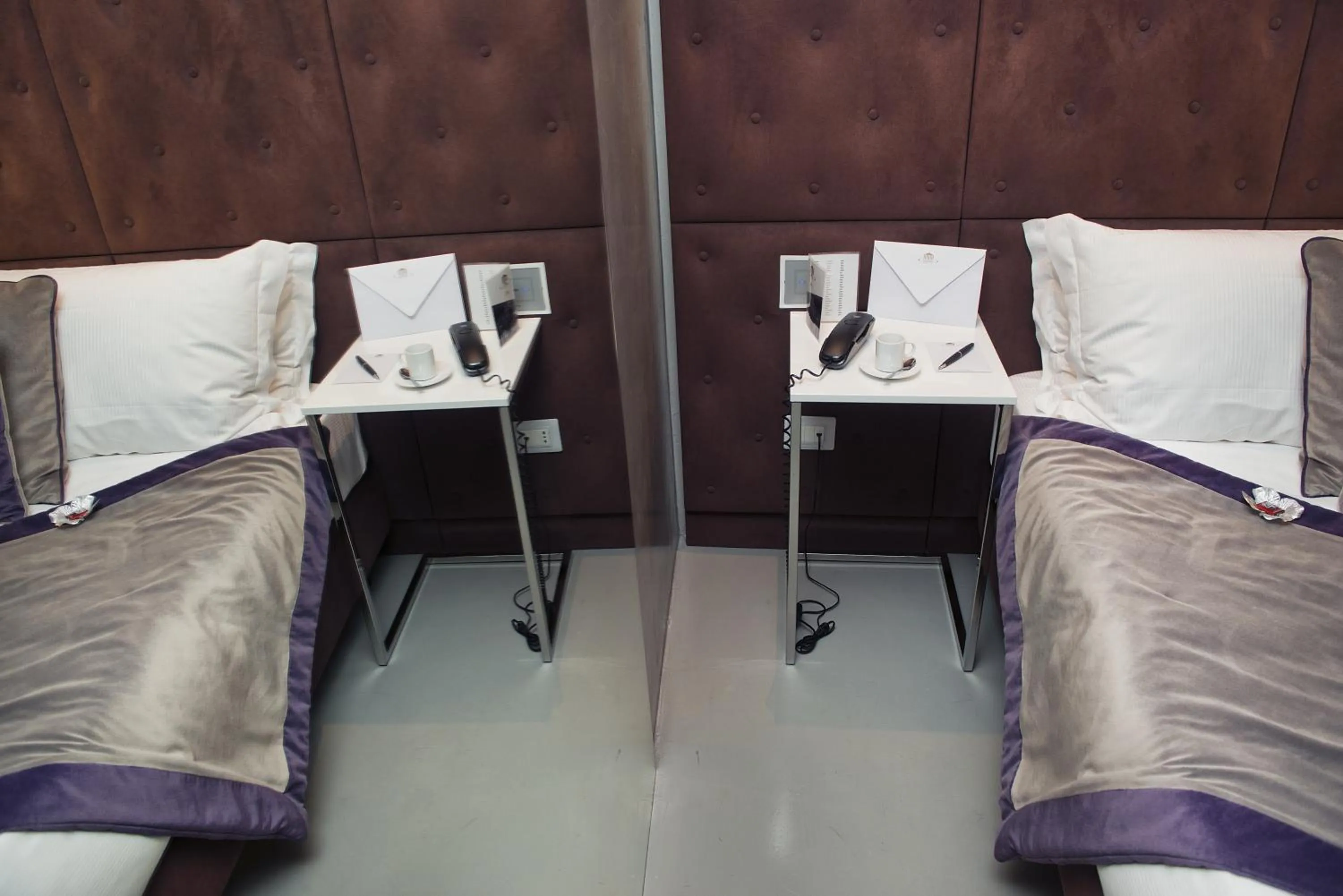 Bed in Torre Argentina Relais - Residenze di Charme