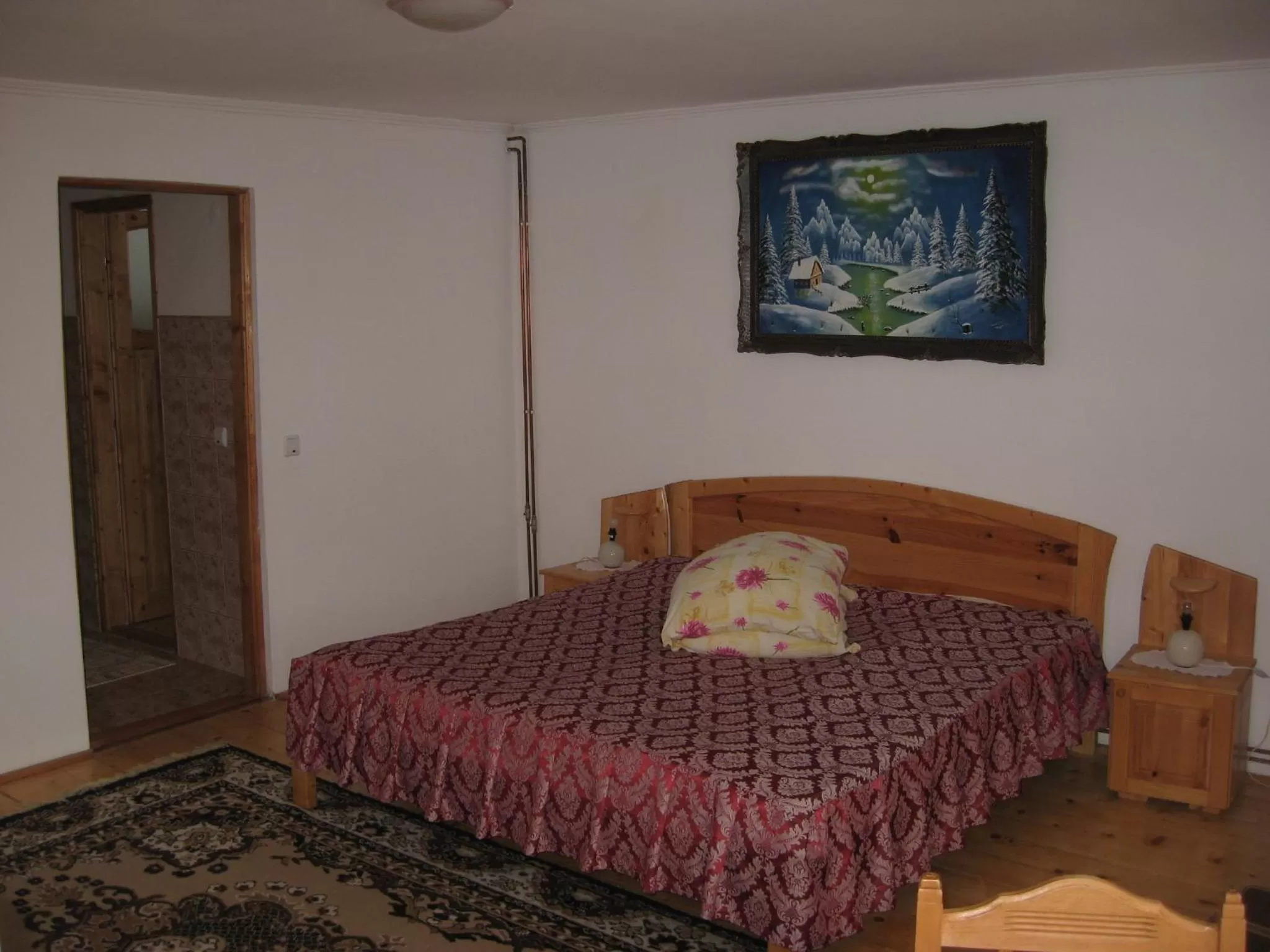 Photo of the whole room, Bed in Pensiunea Luminita