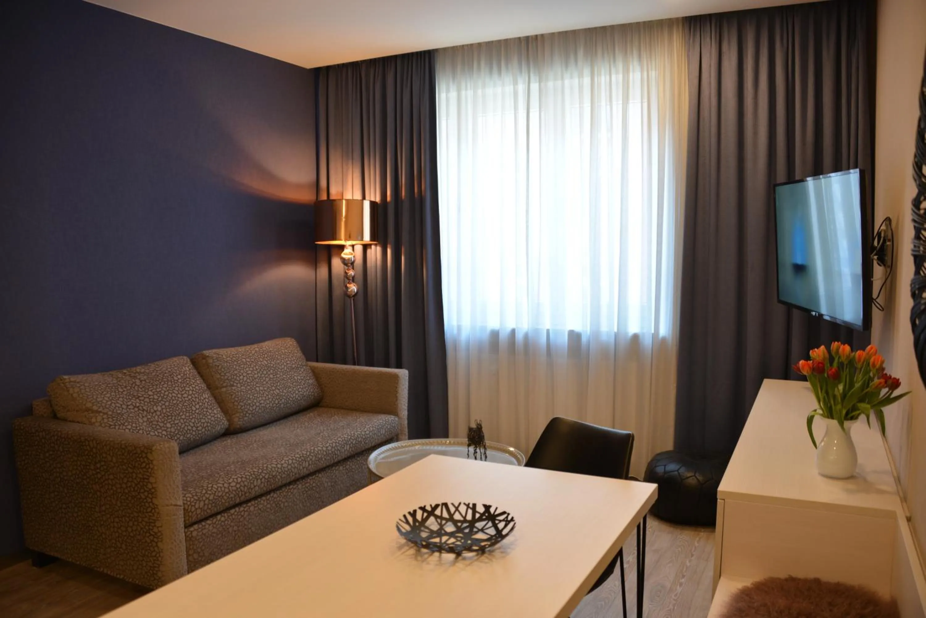 Communal lounge/ TV room in Belle Blue Zentrum