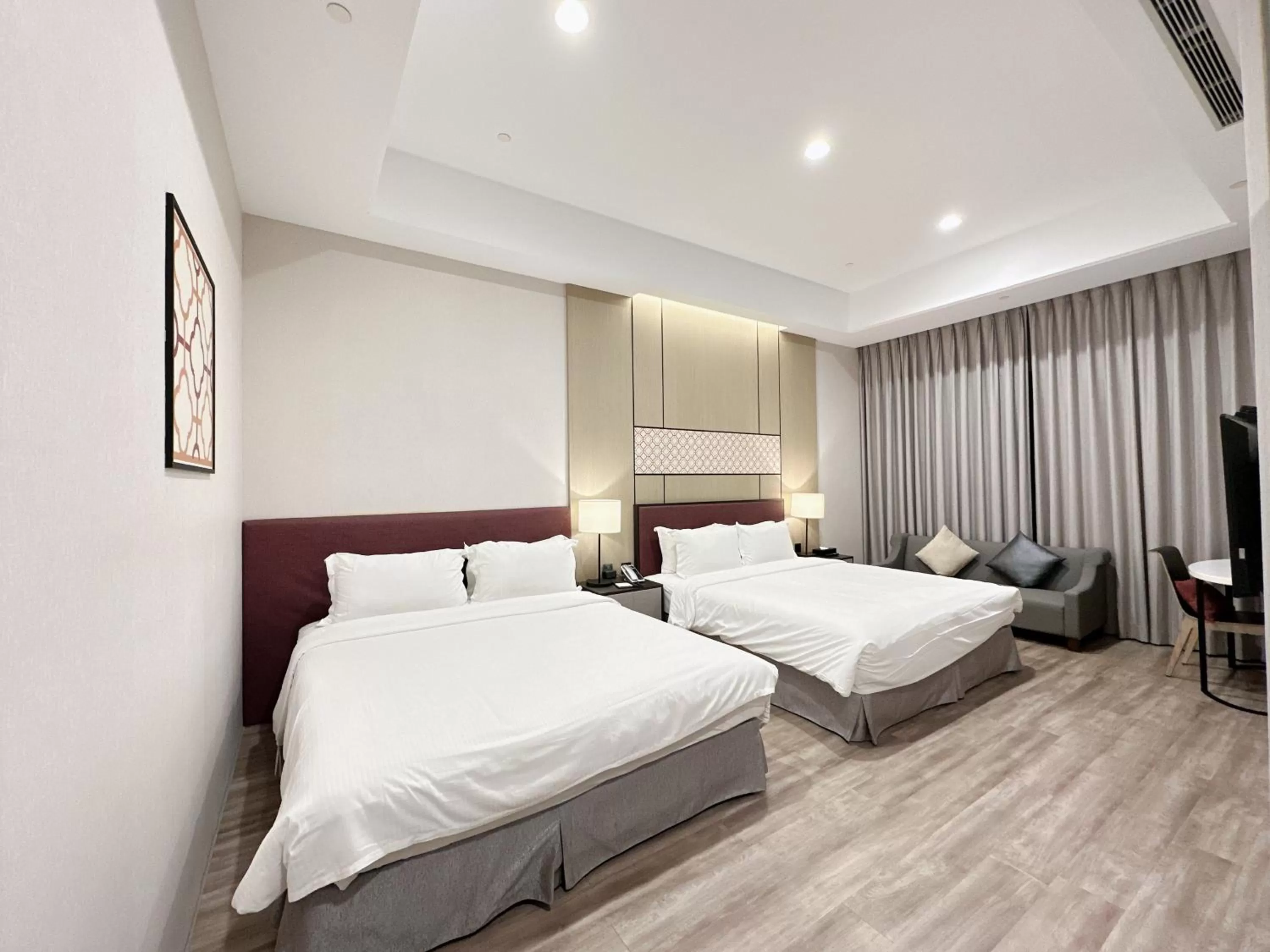 Bed in 台南星鑽國際商旅 Hua Hotel