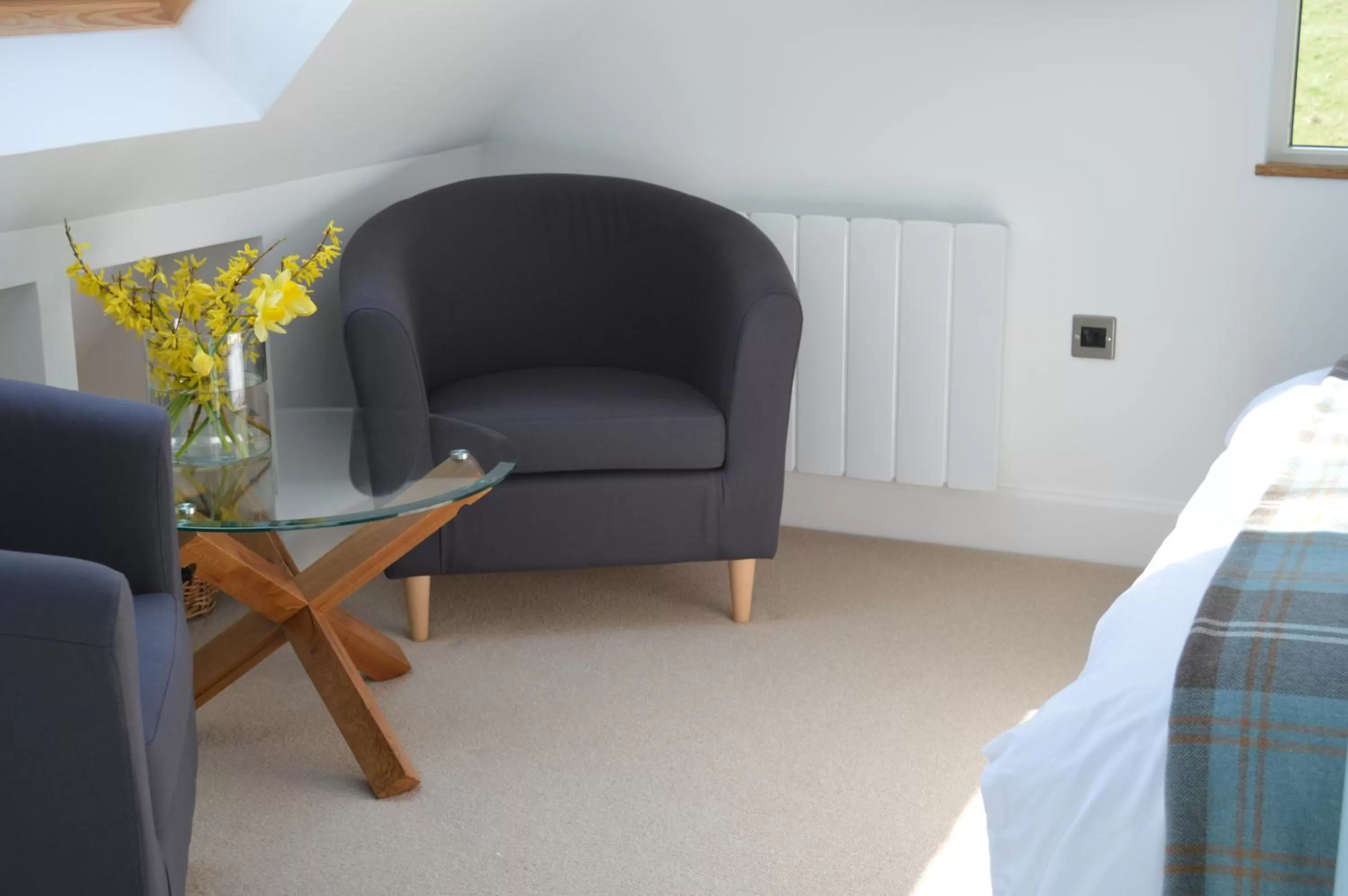 Seating area, Bed in The Steading