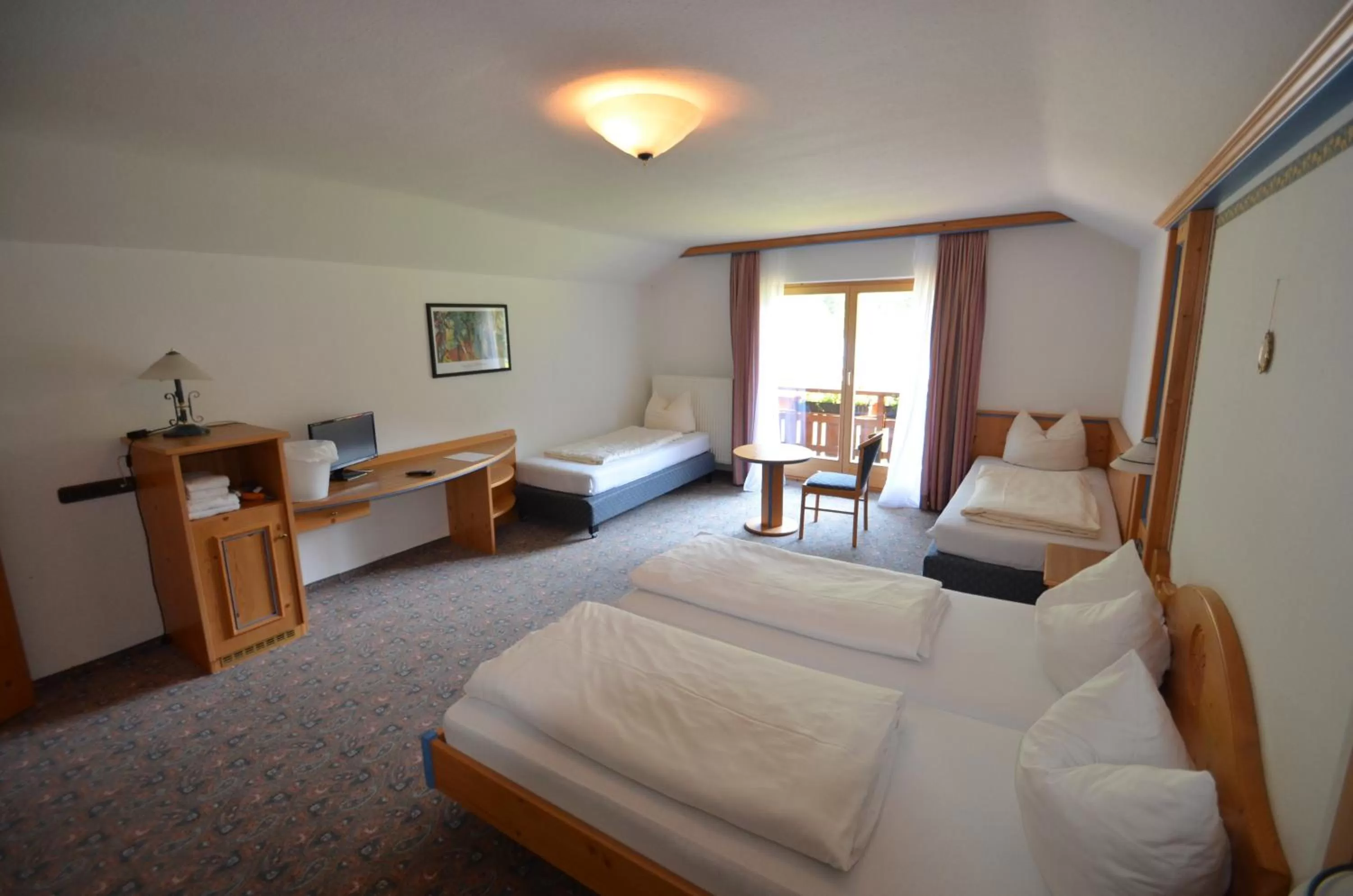 Photo of the whole room, Bed in Alpenhotel Widderstein