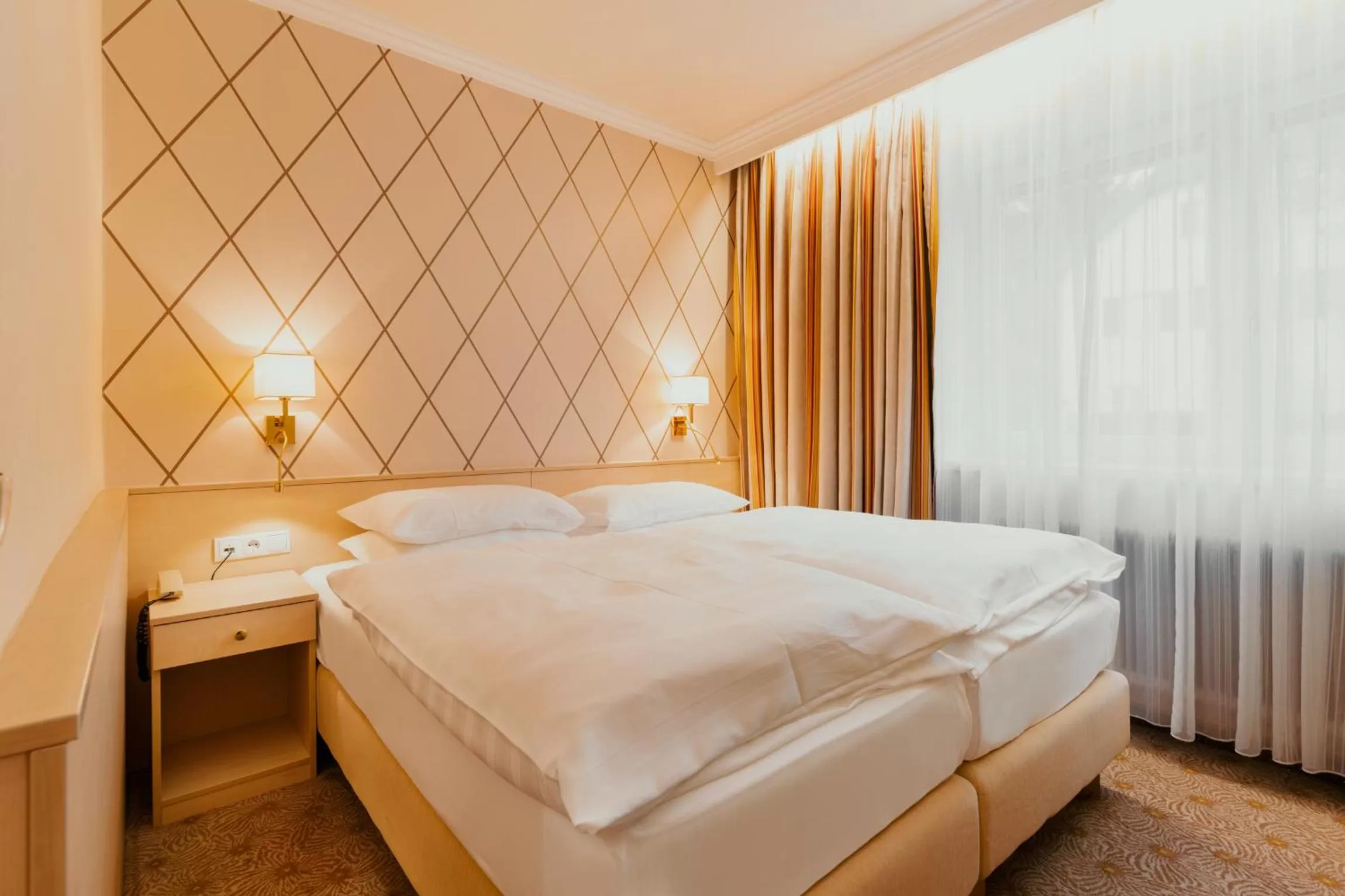 Bed in Hotel Scherer