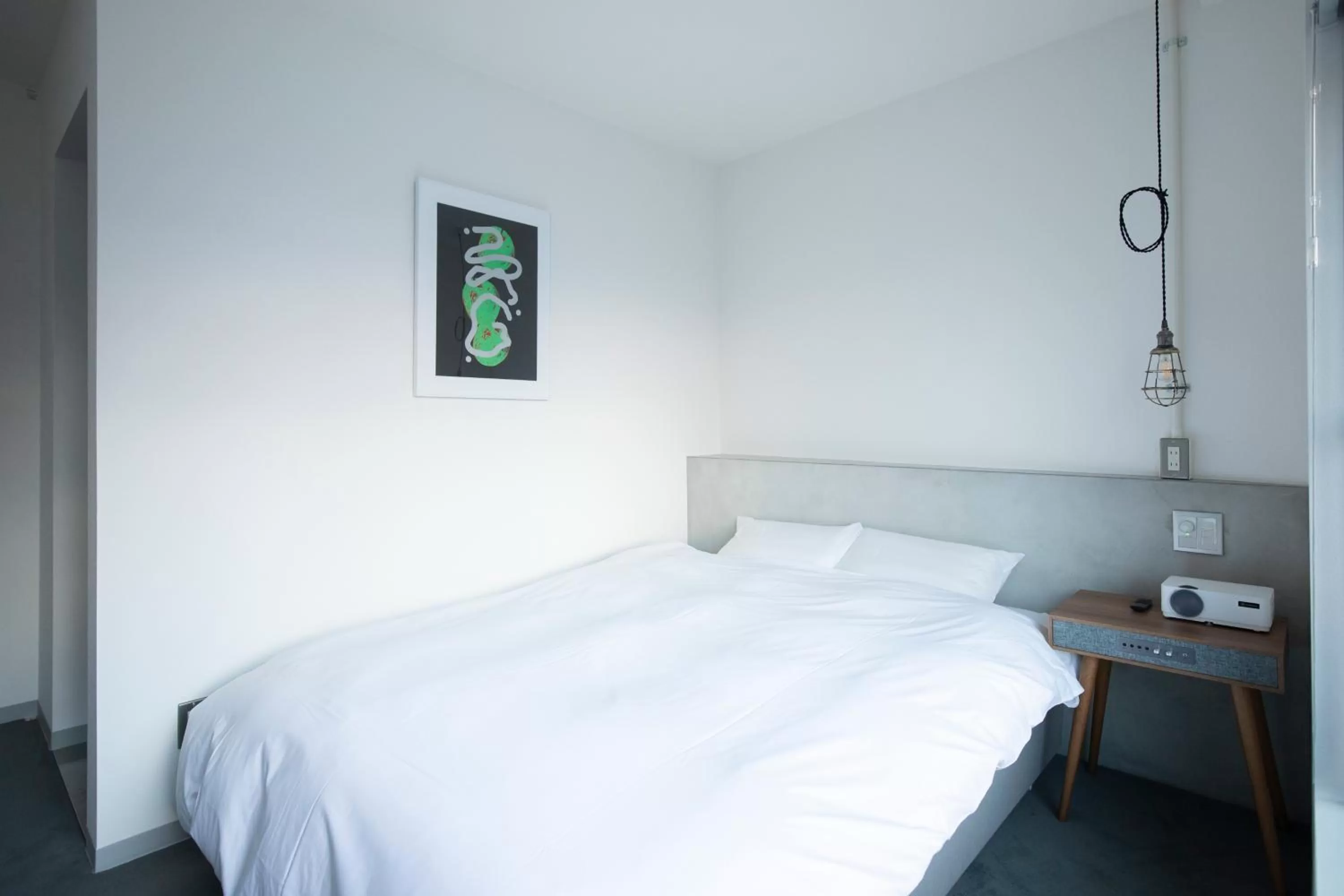 Bed in BENJAMIN HOTEL KANAZAWA