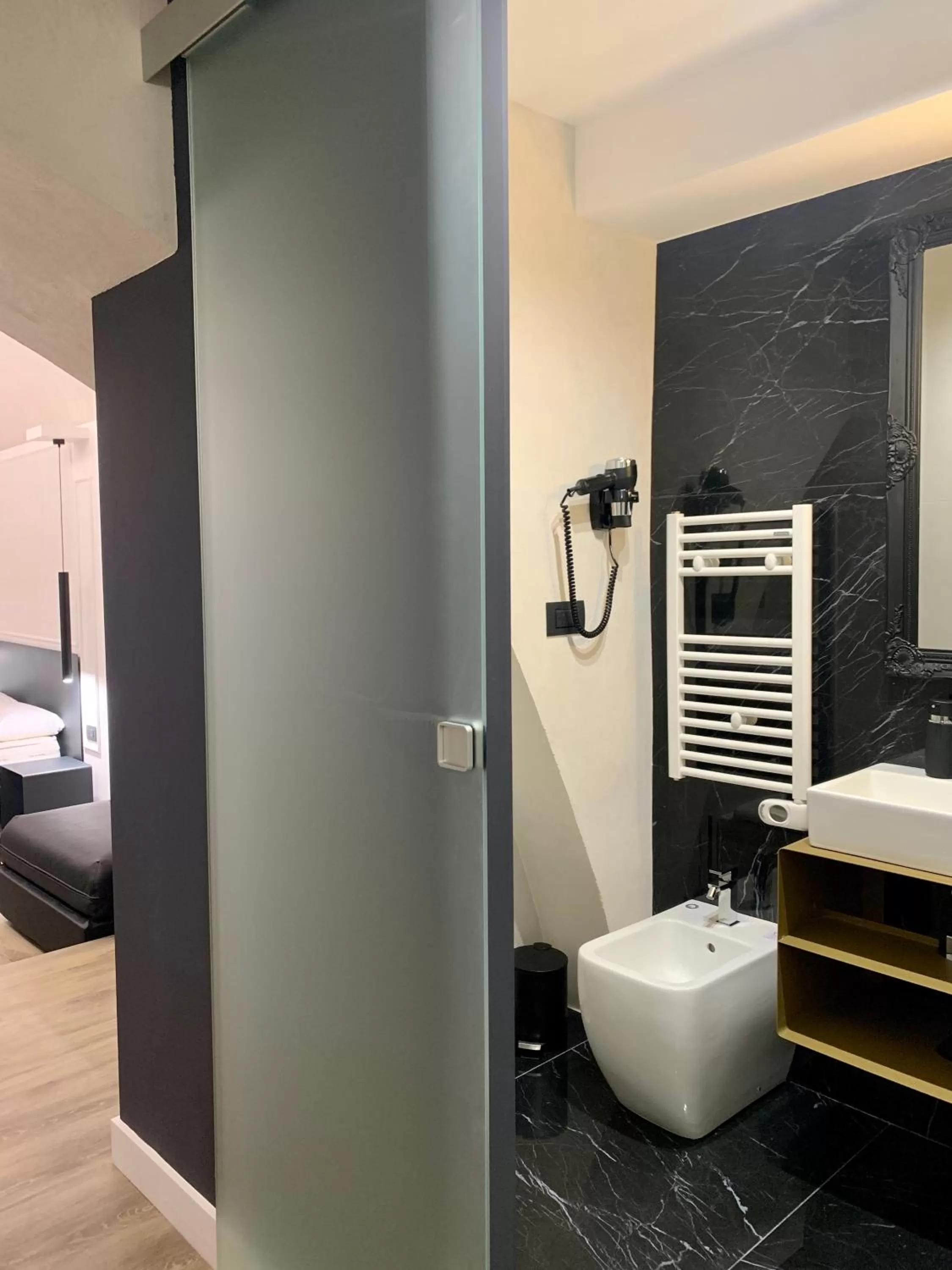 Bathroom in Toledo Boutique Rooms