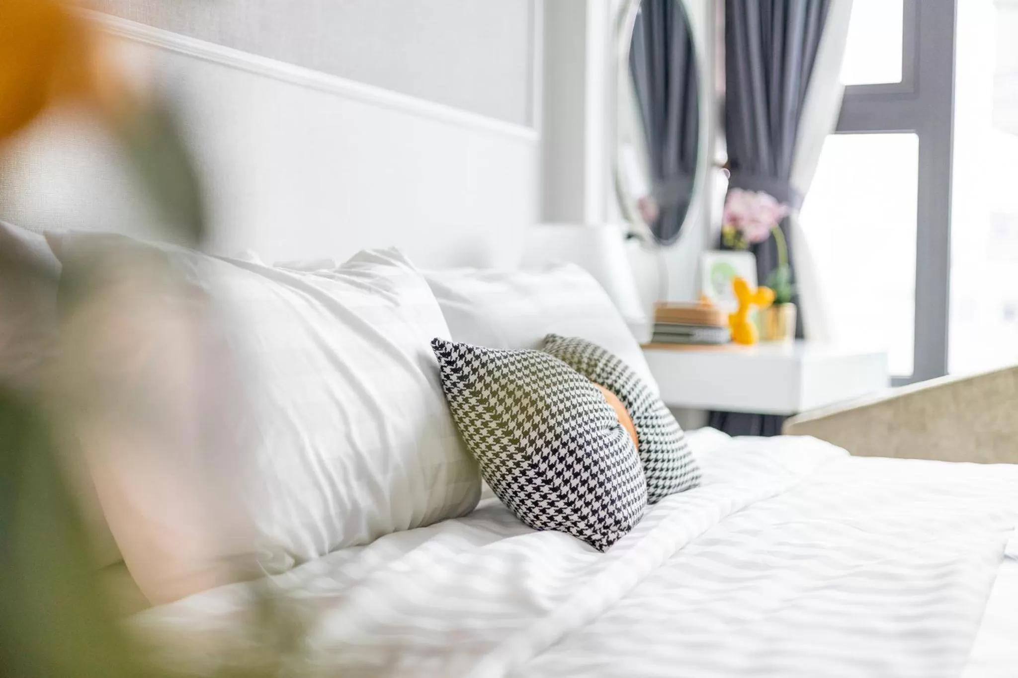 Bed in Ivy Hotel & Apartment