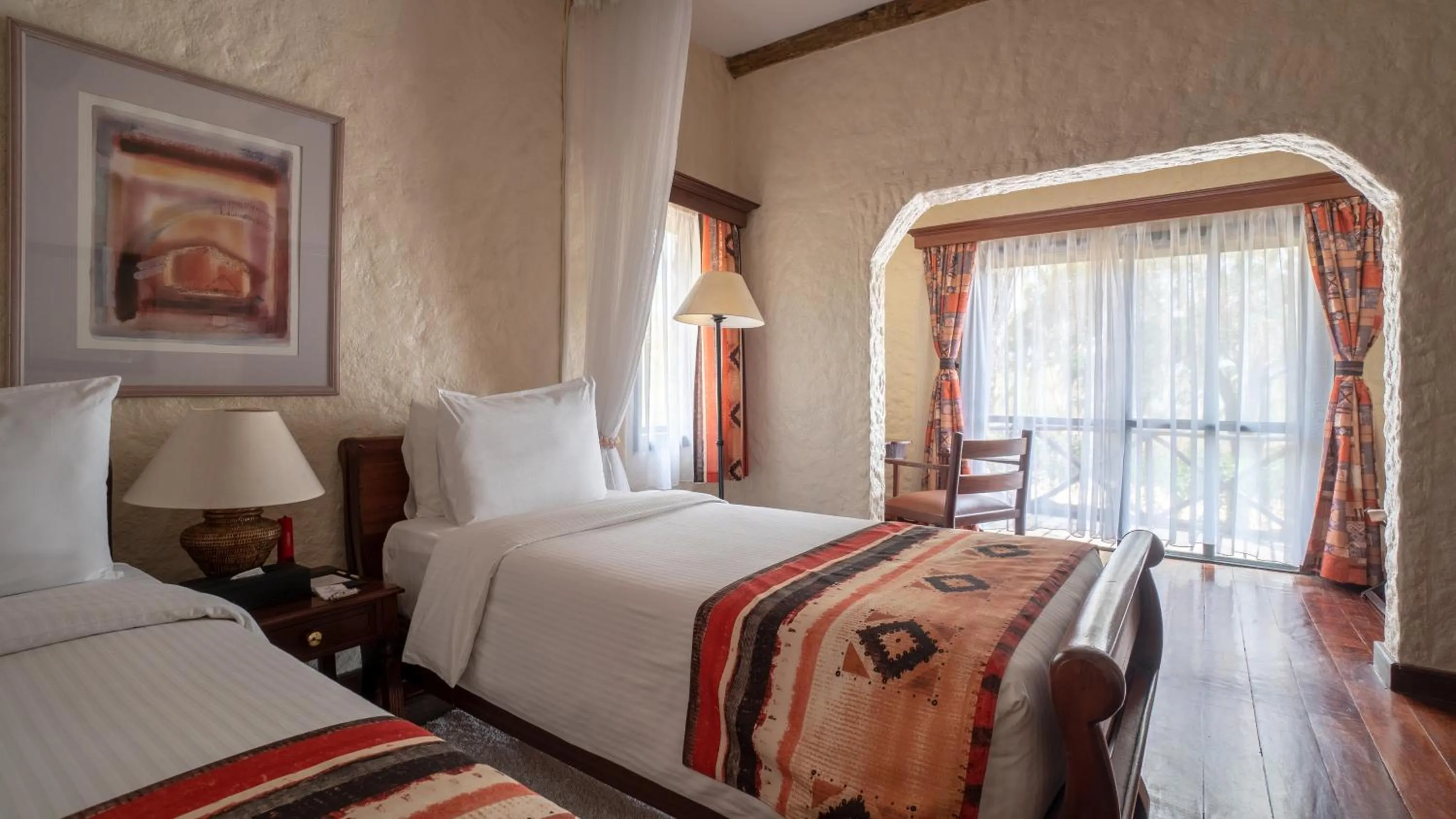 Bed in Sarova Lion Hill Game Lodge