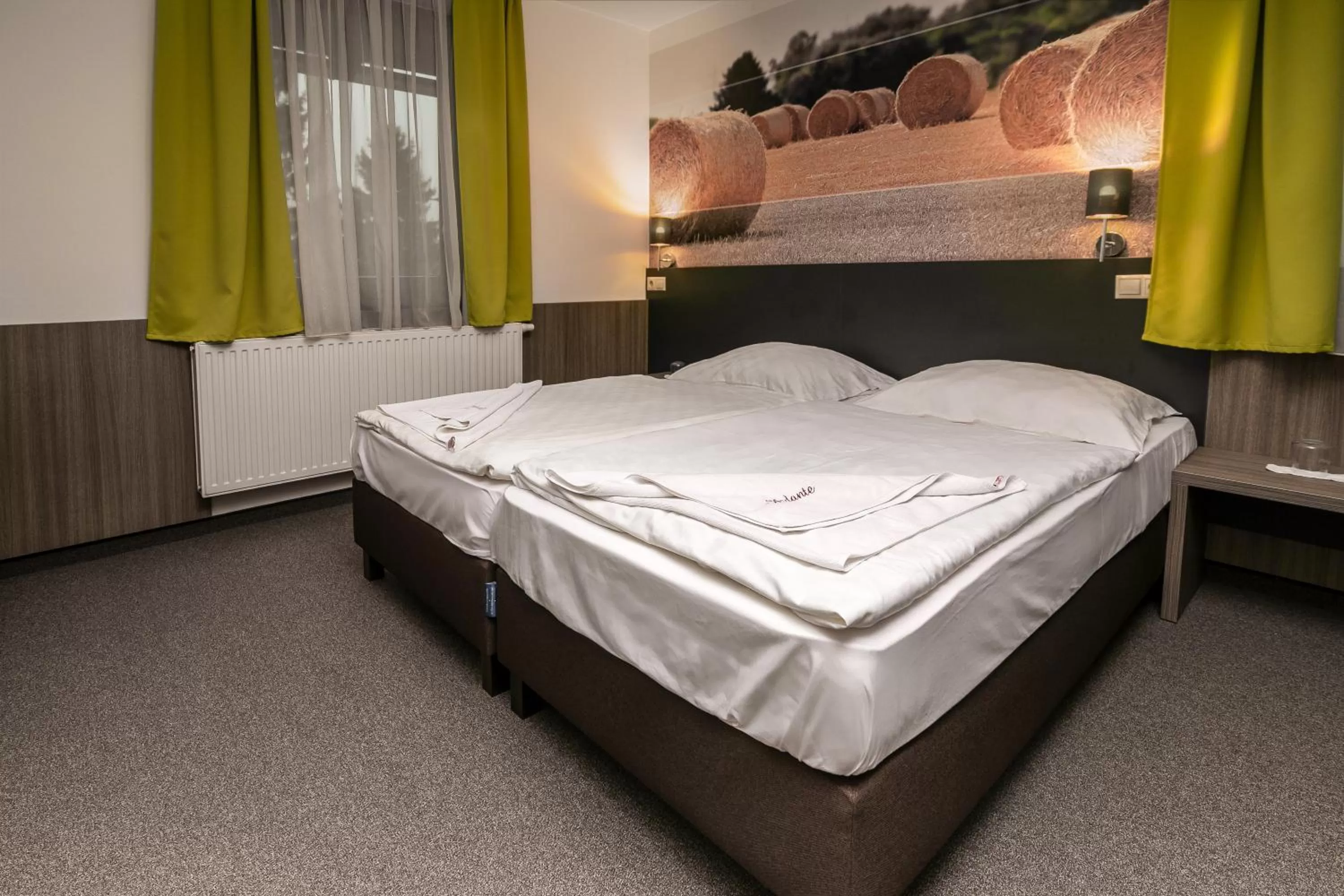 Bed in Andante Pension & Restaurant