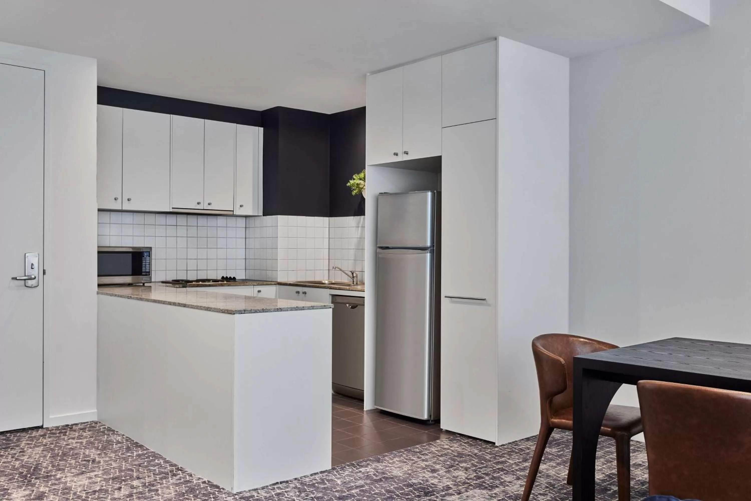 Kitchen or kitchenette in Adina Apartment Hotel Melbourne Flinders Street