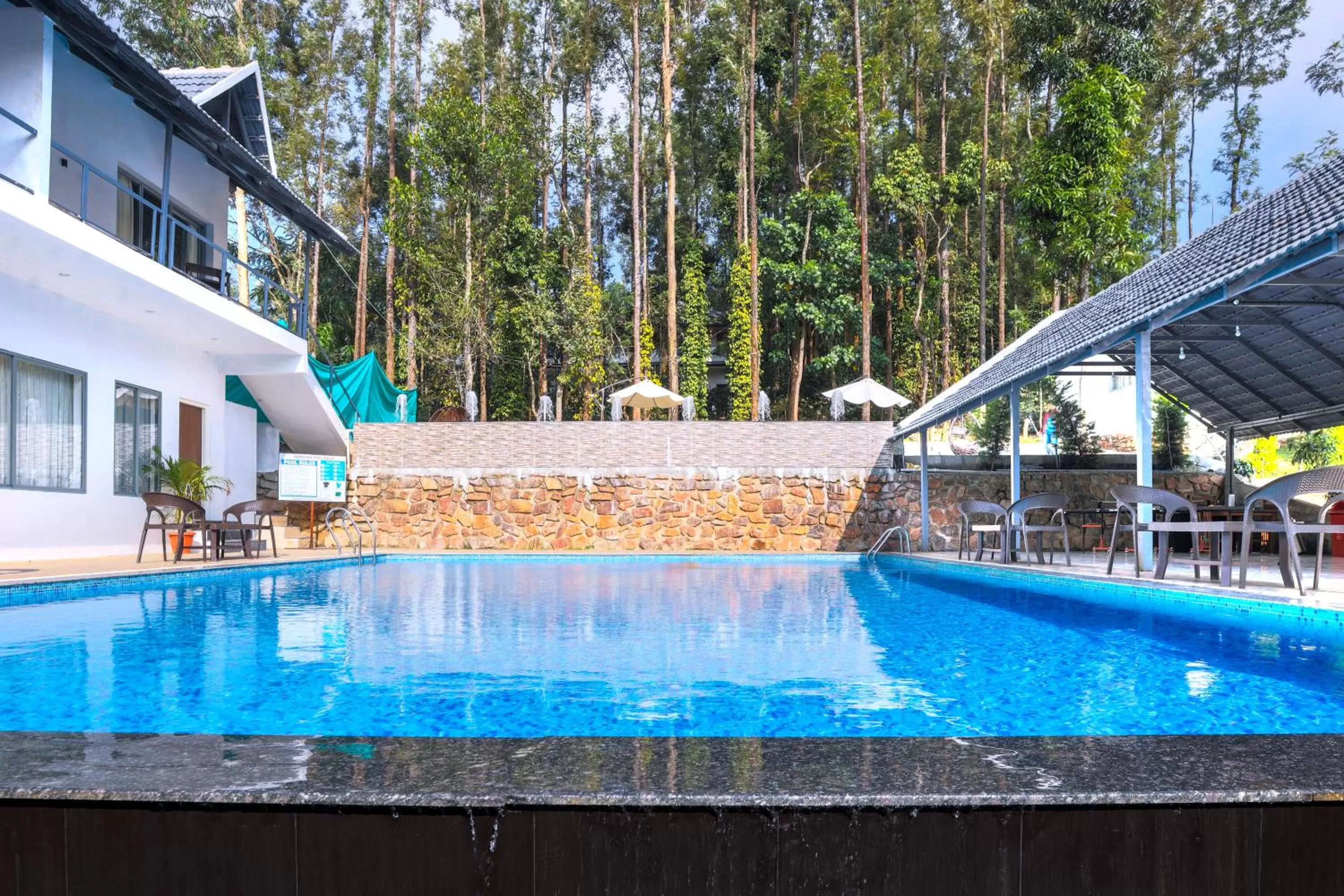 Swimming pool in The Spectrum Resort - Chikmagalur
