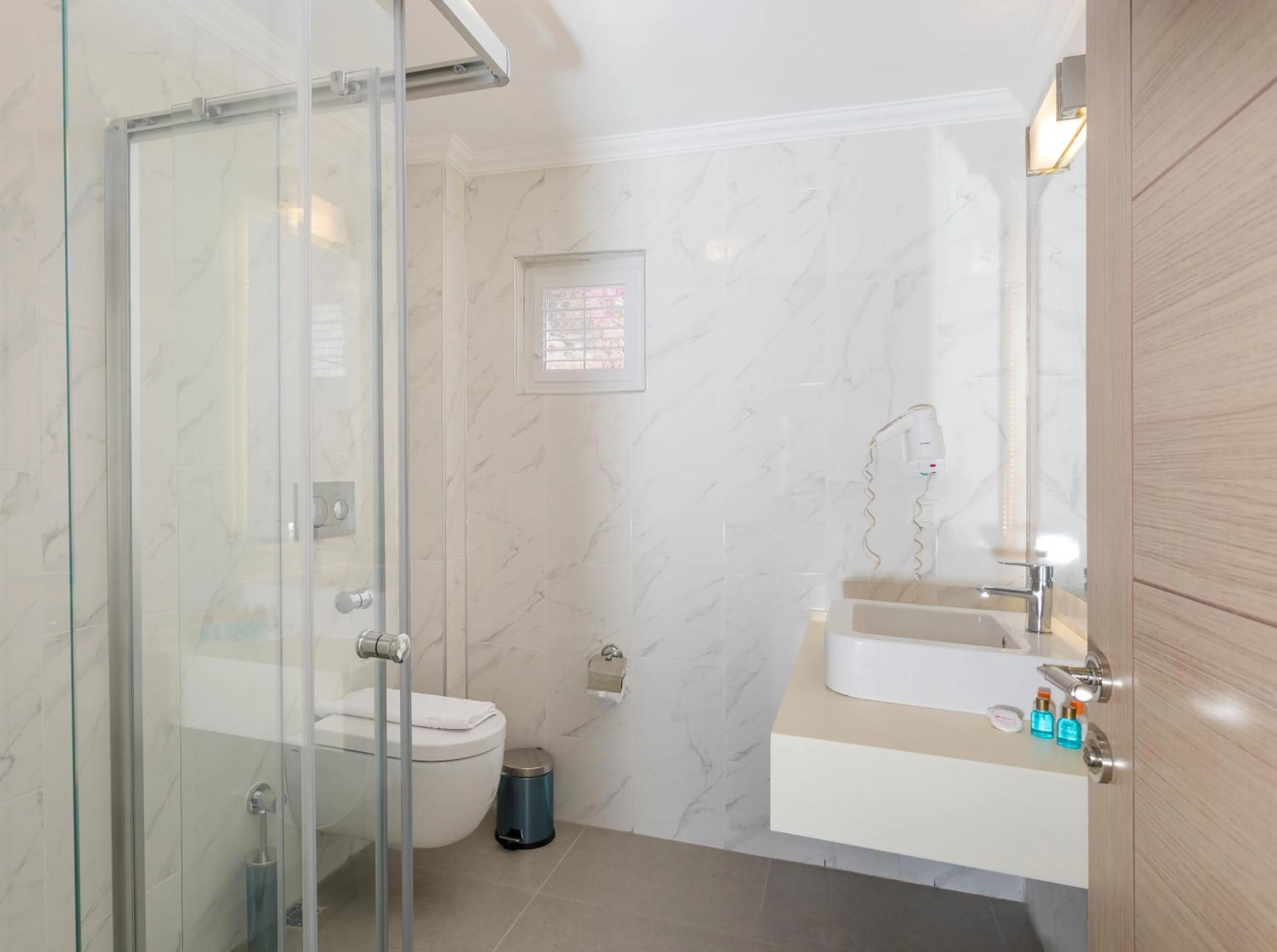 Toilet in Moonshine Hotel & Suites