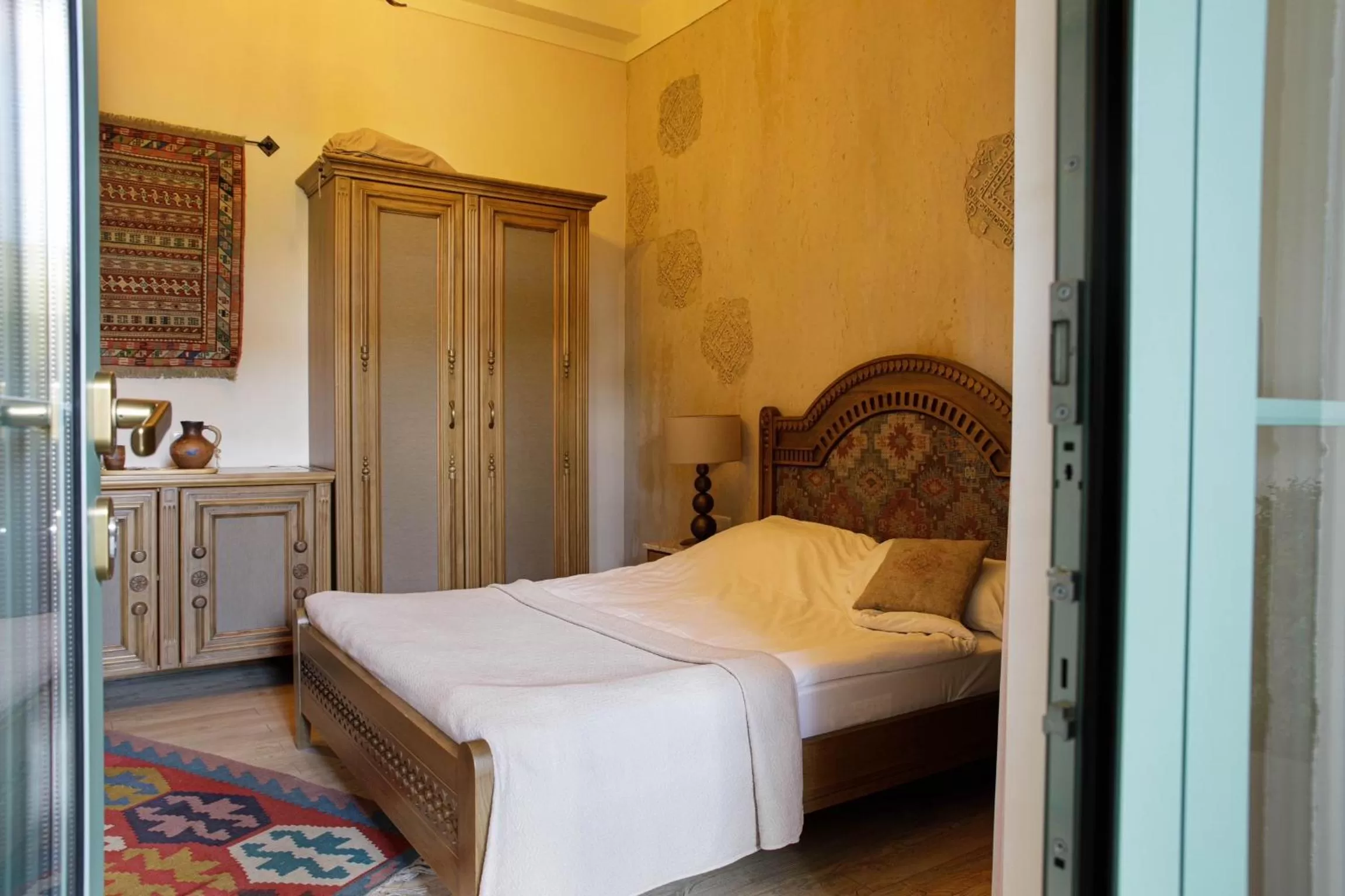 Bed in Boutique ETHNO HOTEL