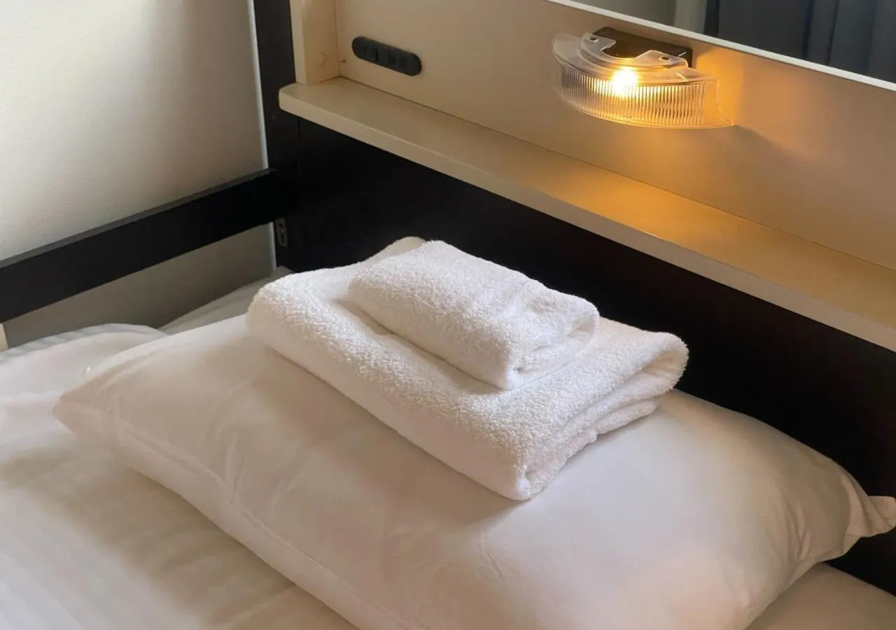 Bedroom, Bed in Hotel Graphy Nezu