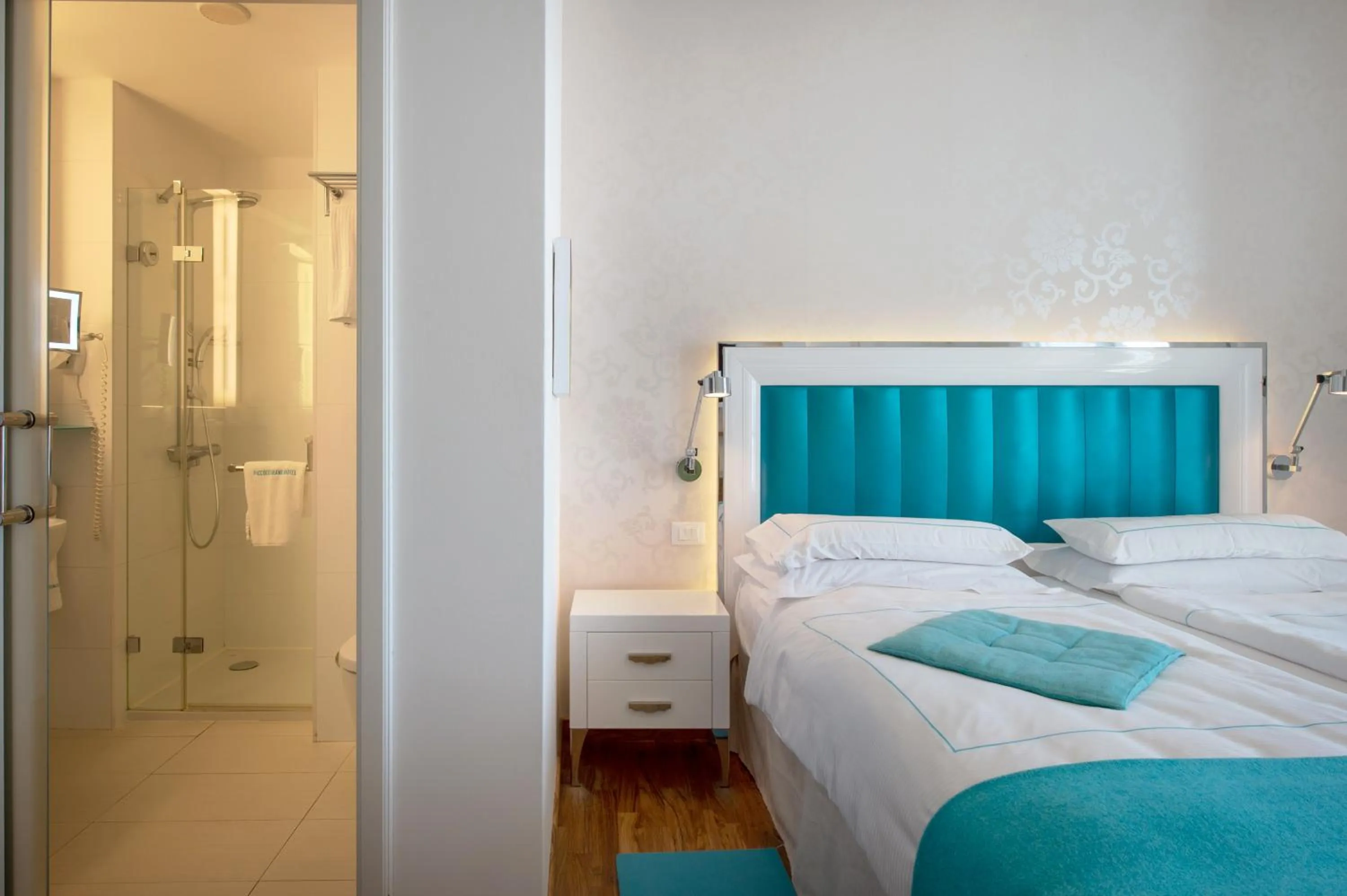 Photo of the whole room, Bed in Piccolo Grand Hotel