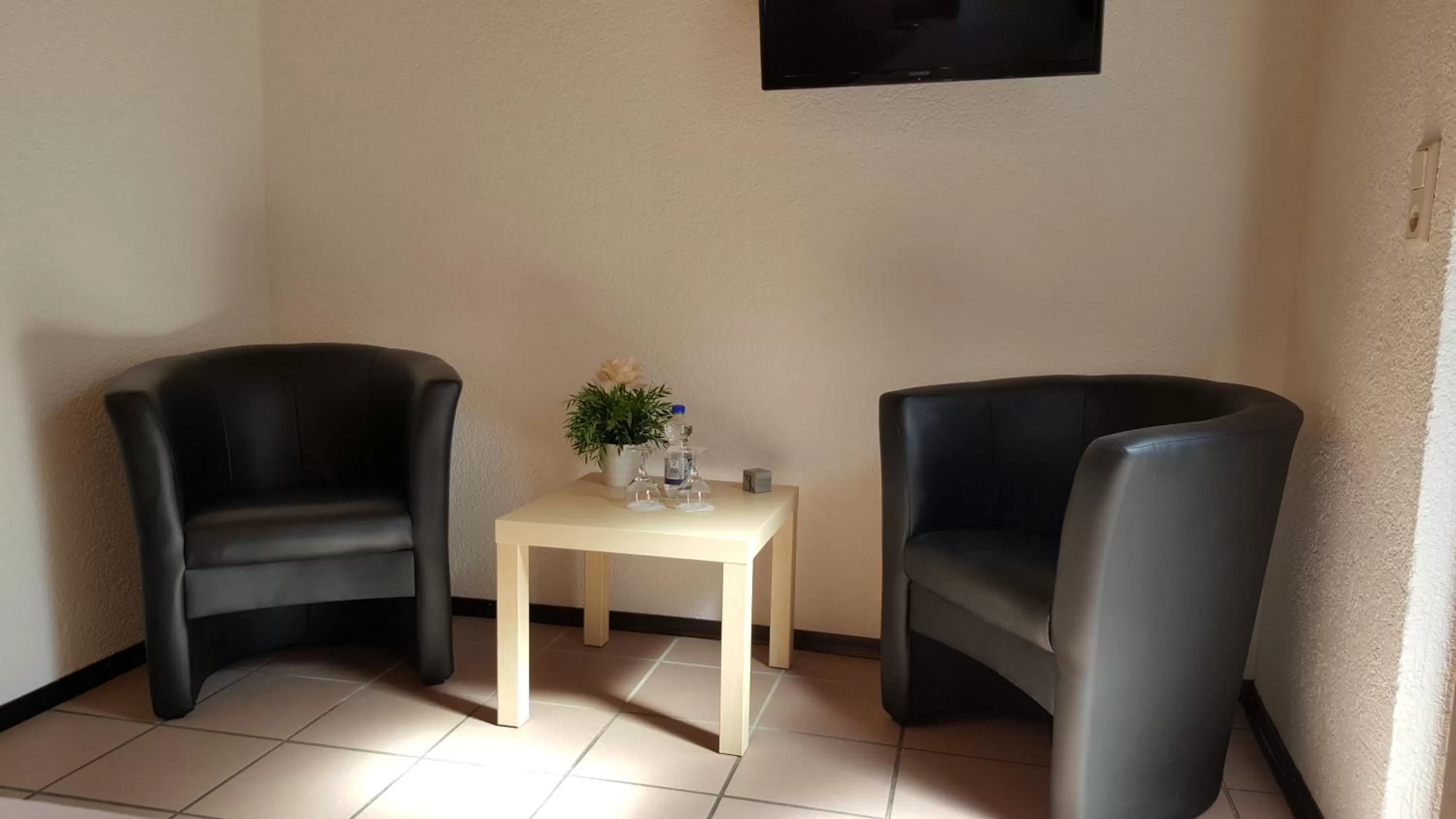 Seating area in Hotel Exquisite