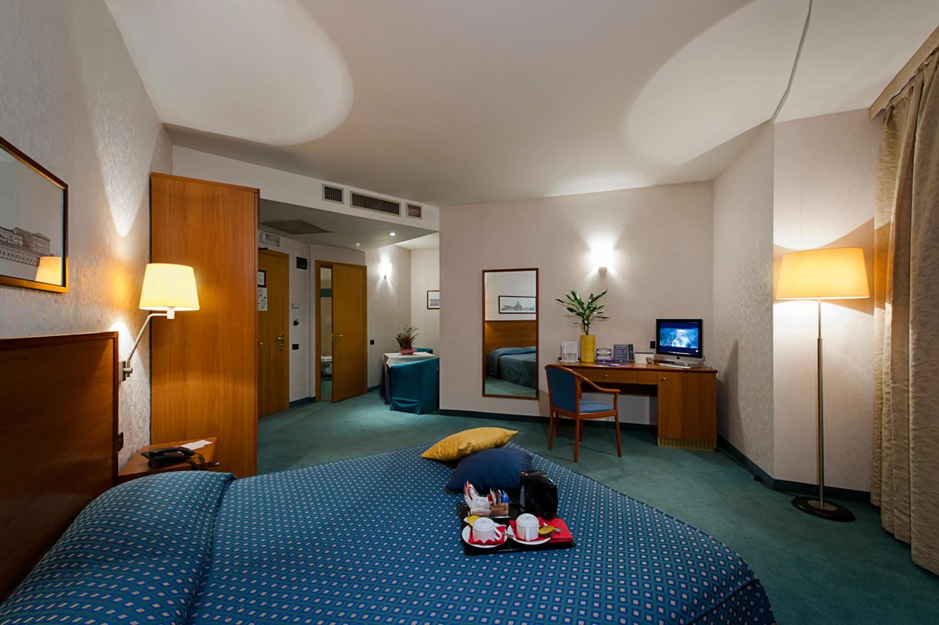 Bed in Classic Hotel Tulipano