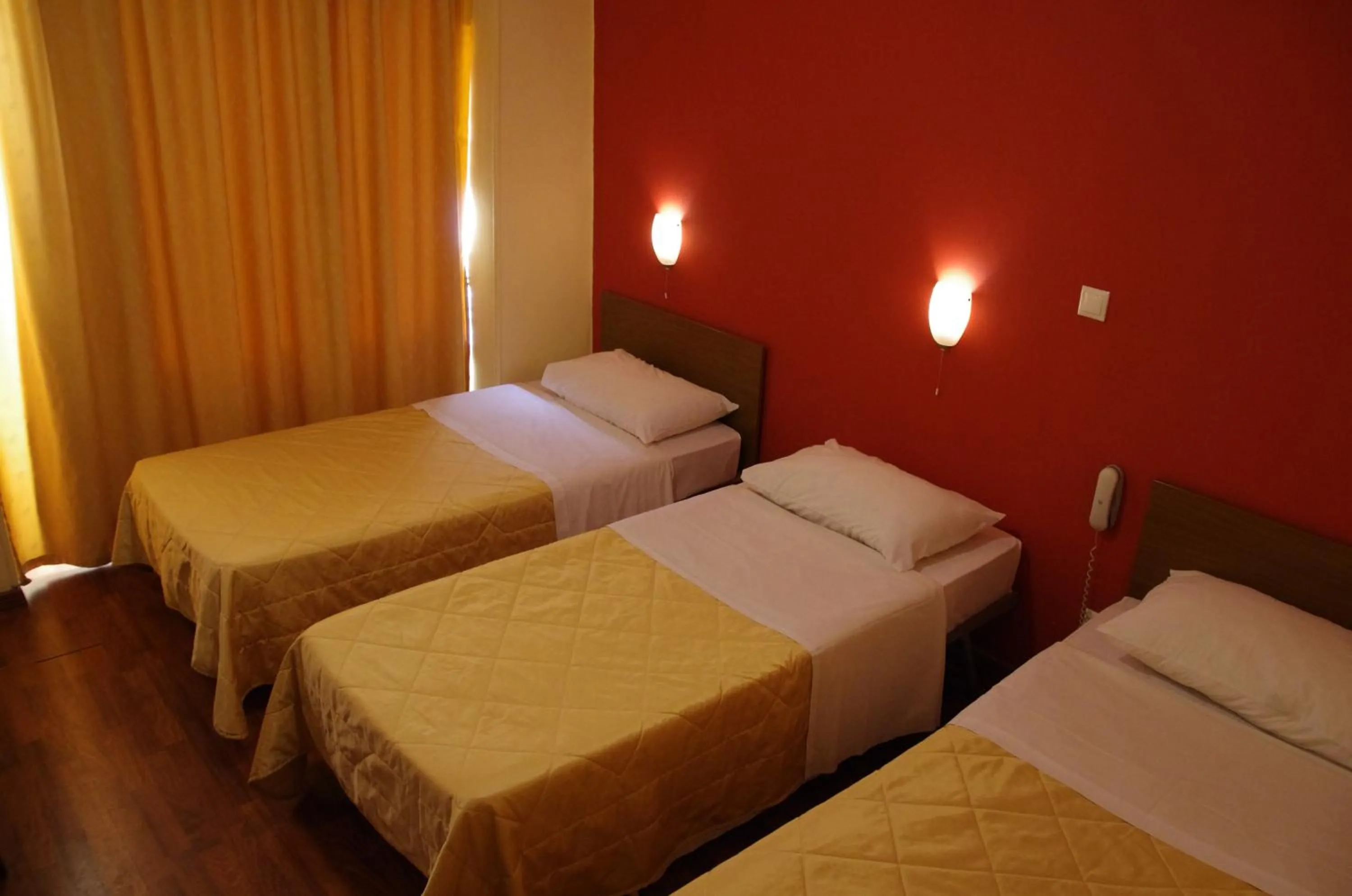 Bed in Hotel Exarchion