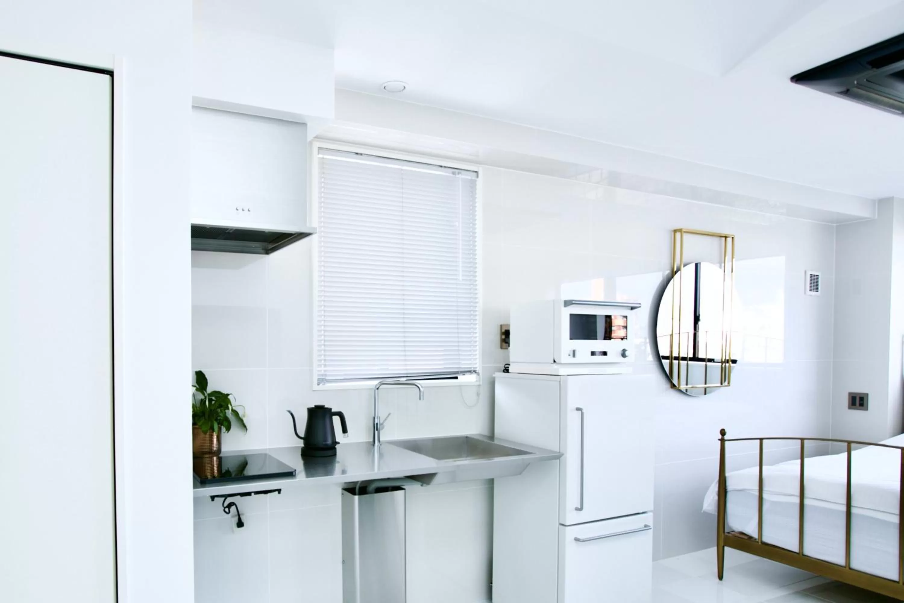 Kitchen or kitchenette, Bed in THE ROOT2 HOTEL