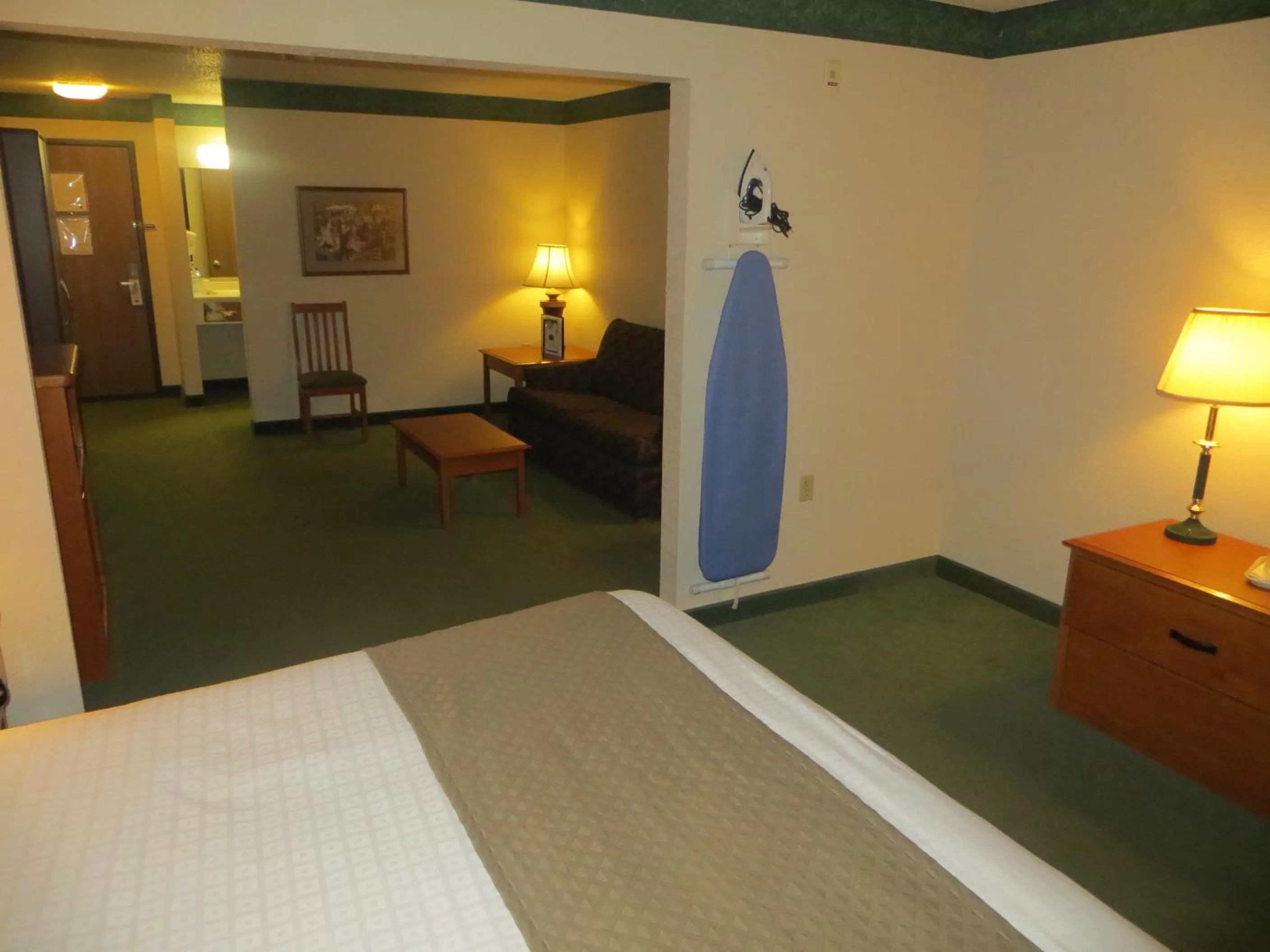 Bed in AmericInn by Wyndham Manitowoc