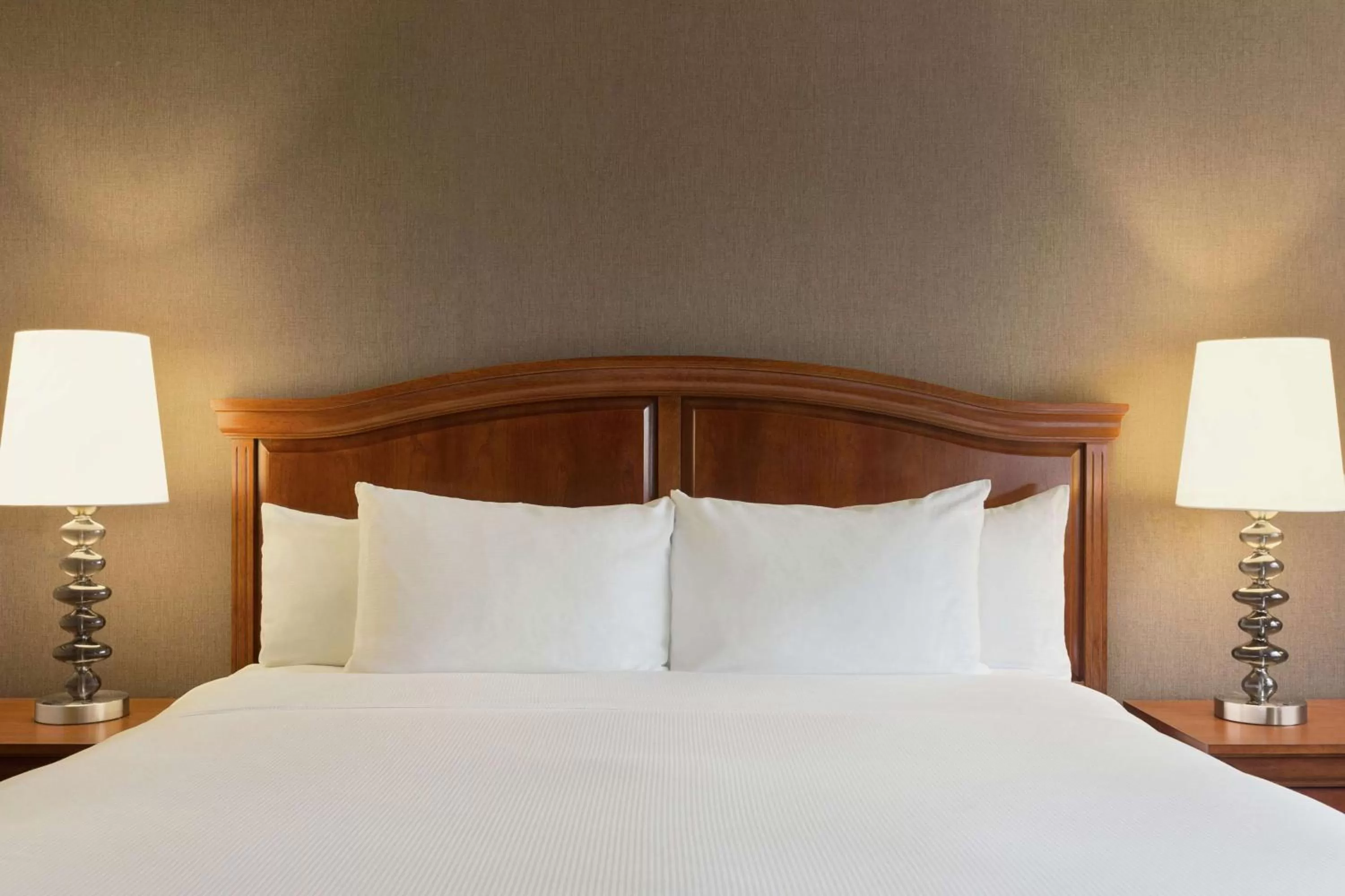 Bed in DoubleTree by Hilton Hotel Detroit Novi