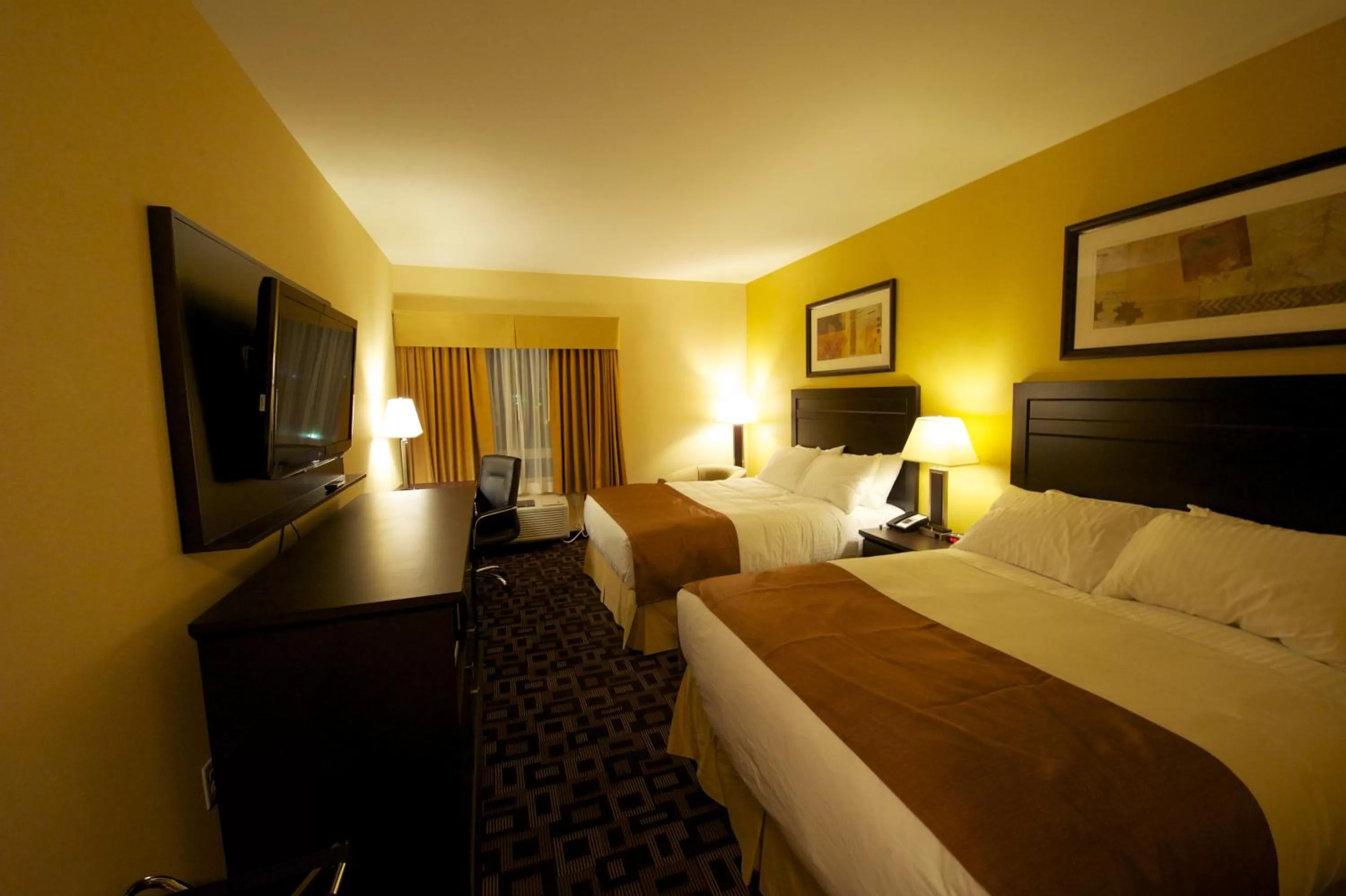 Photo of the whole room, Bed in Days Inn & Suites by Wyndham Winnipeg Airport Manitoba