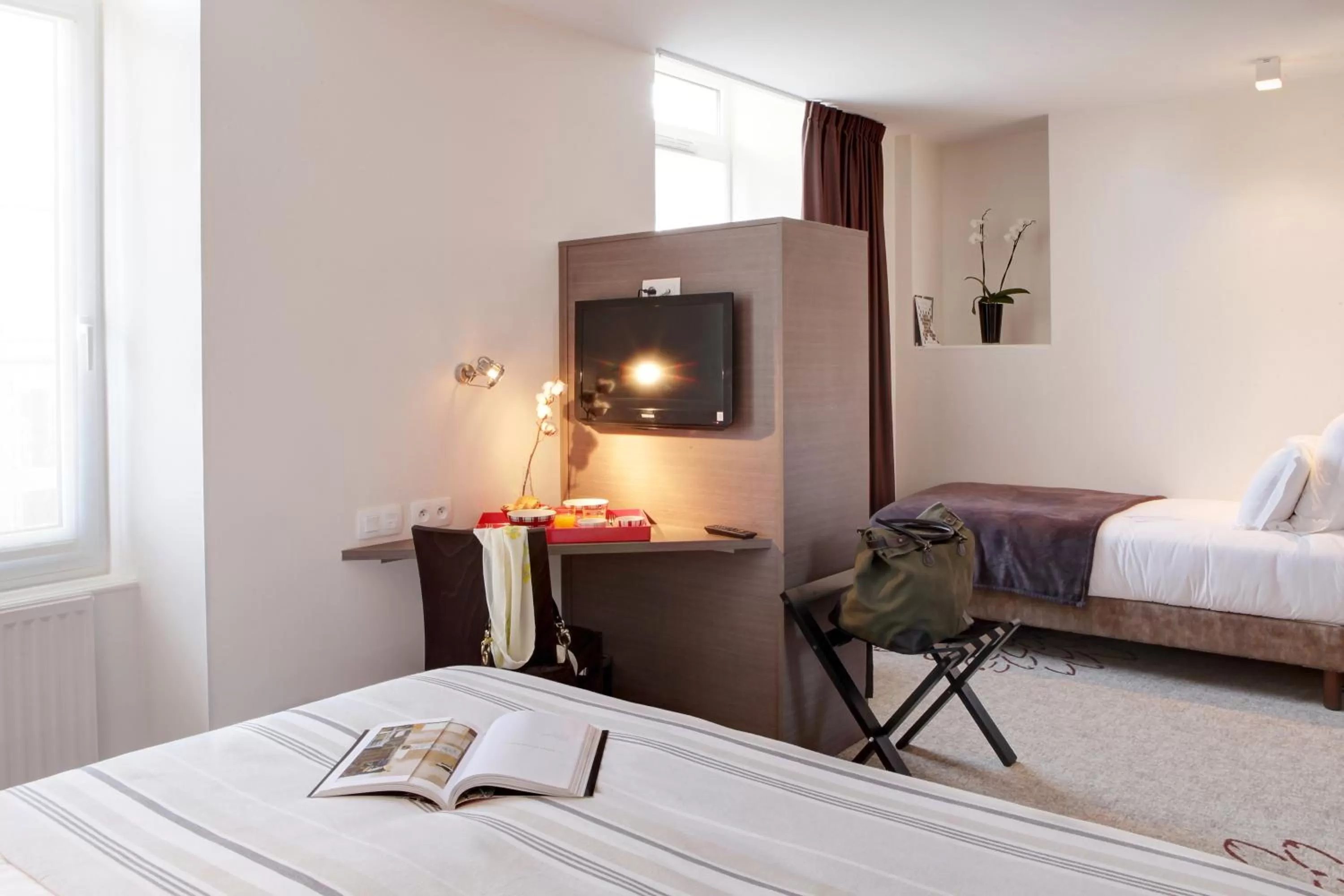 Bed in Hôtel Le Benhuyc