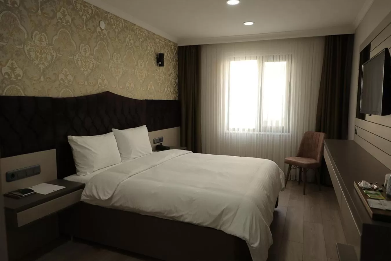 Bed in ELİT OTELHAN