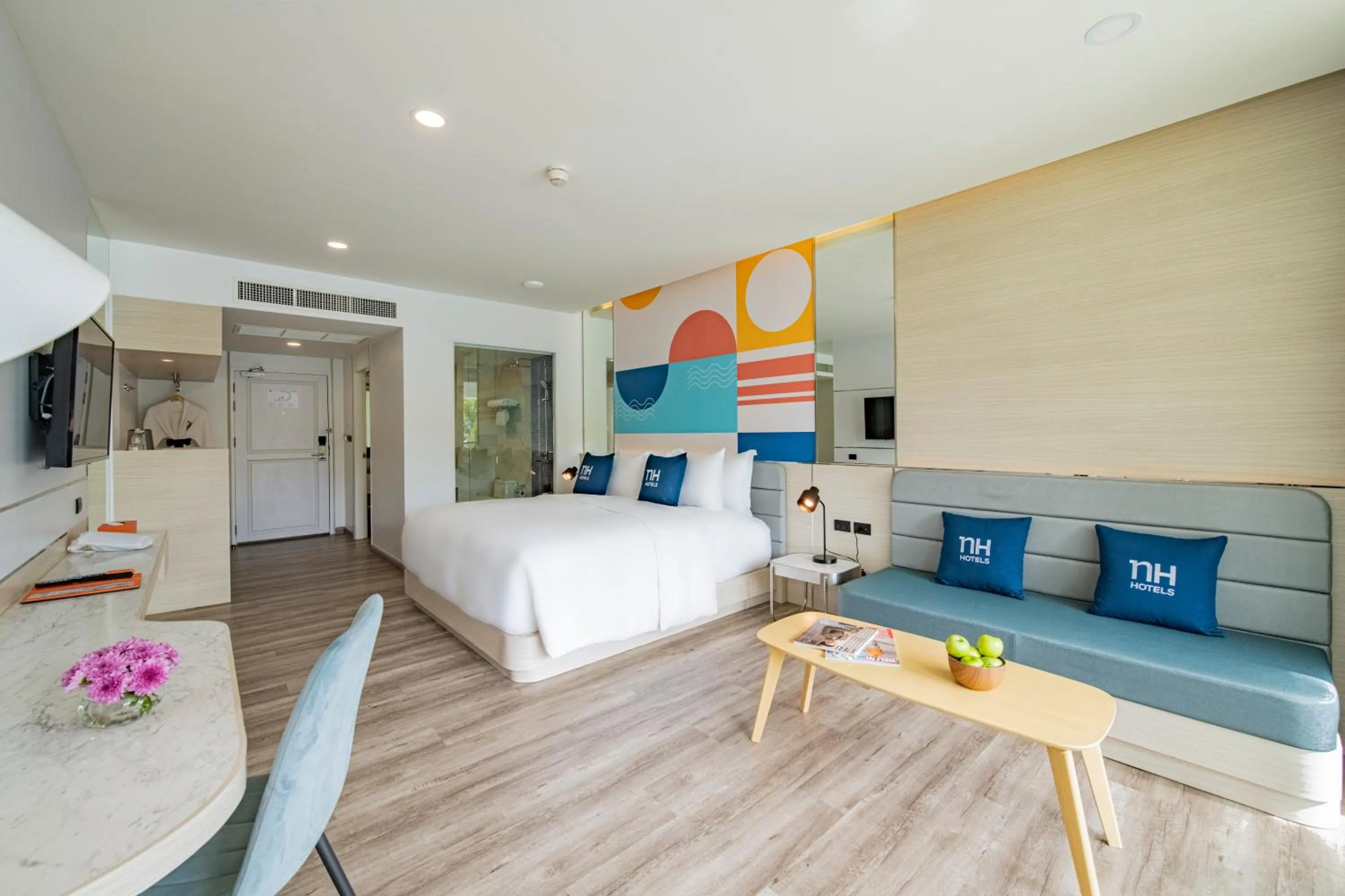 Bed in NH Boat Lagoon Phuket Resort