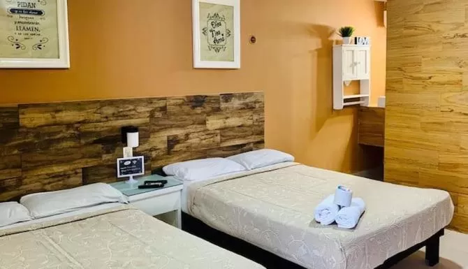 Bed in DNA Cancun Hotel y Posada