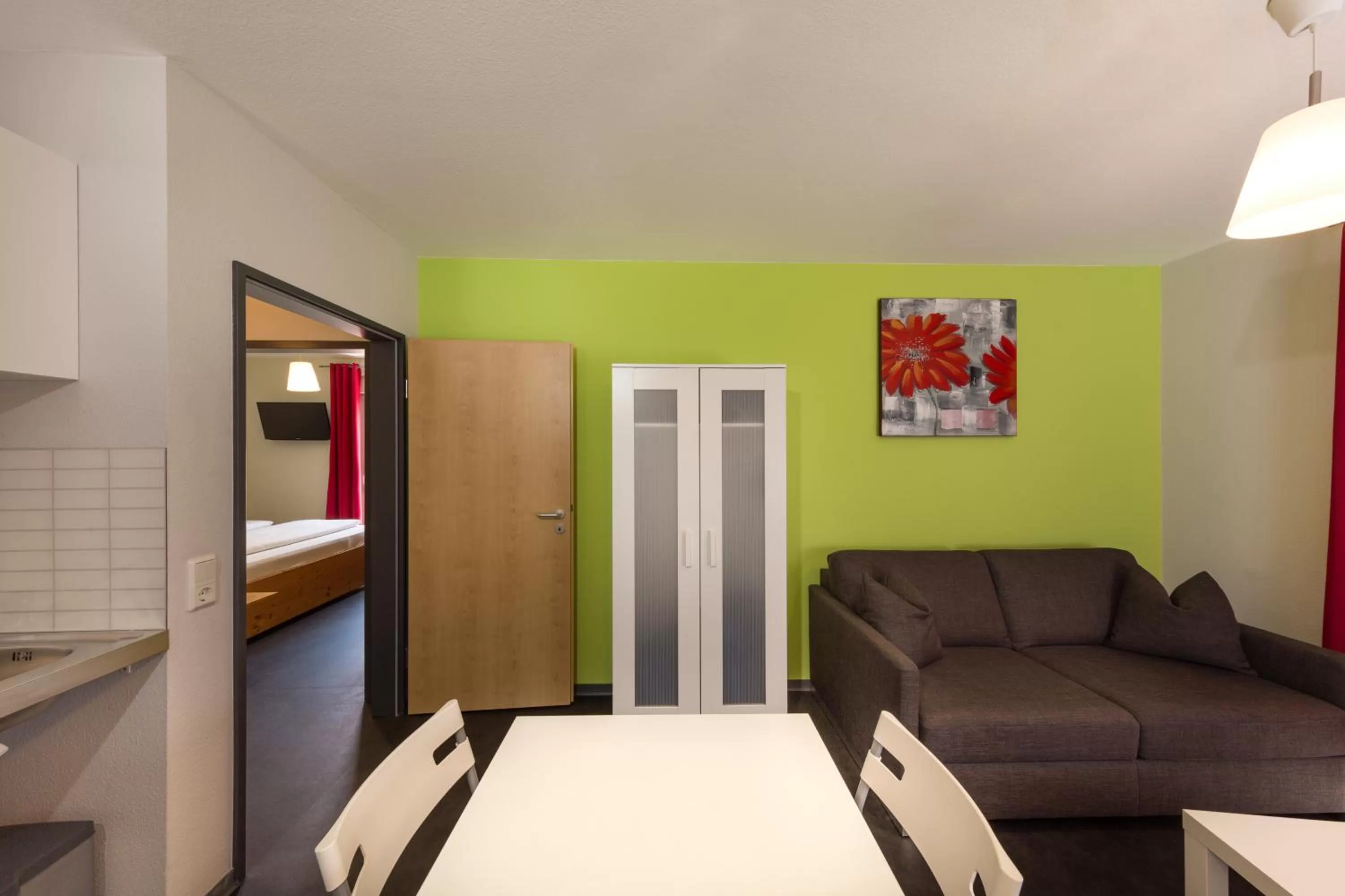 Living room, Bed in Hotel Demling