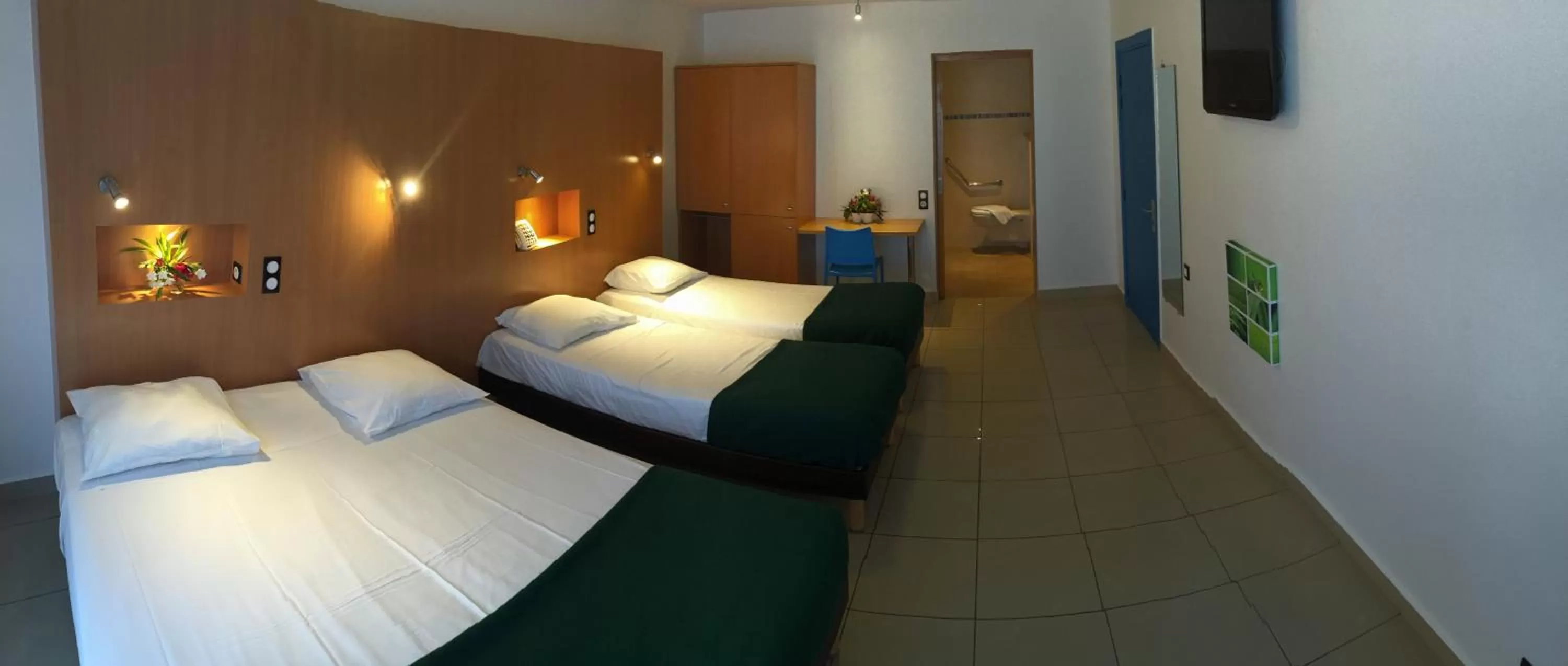 Bed in Karaibes Hotel