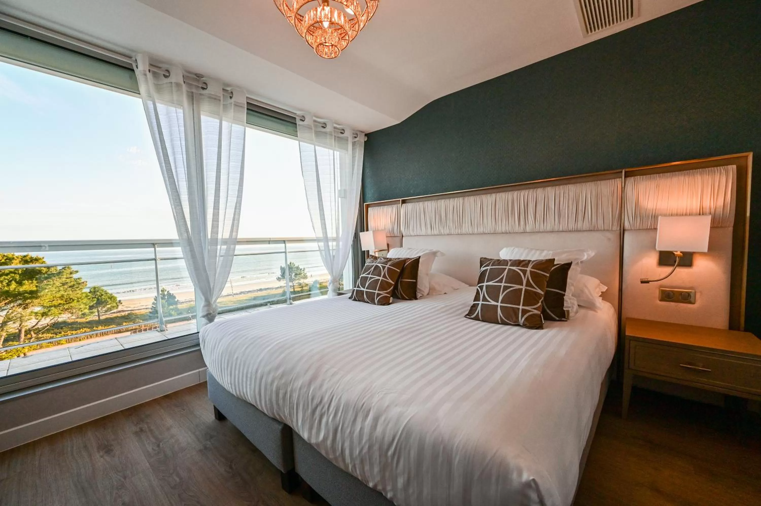 Bed in Le Diana Hôtel & Spa