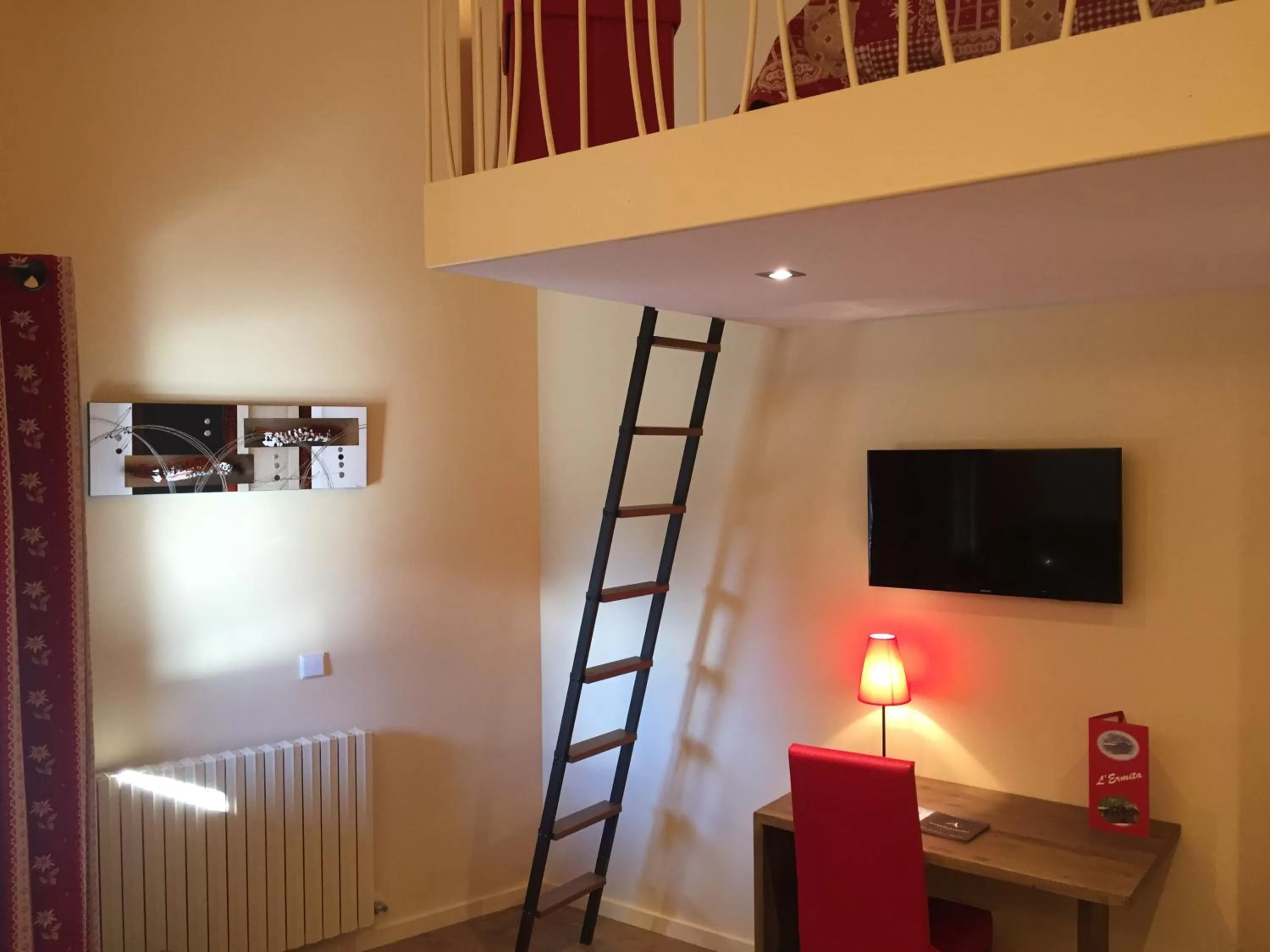 Bedroom in Hotel L’Ermita B&B