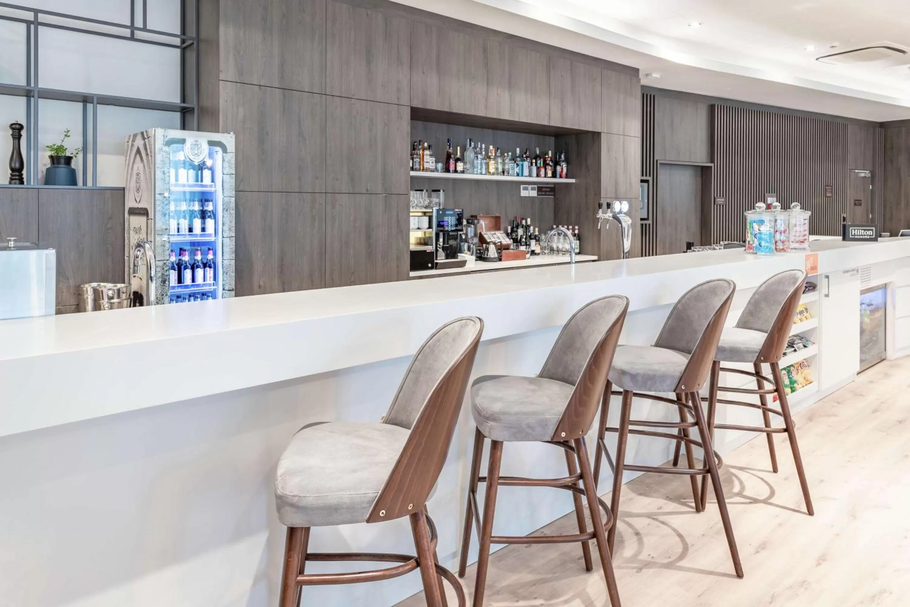 Lounge or bar in Hampton by Hilton Oswiecim