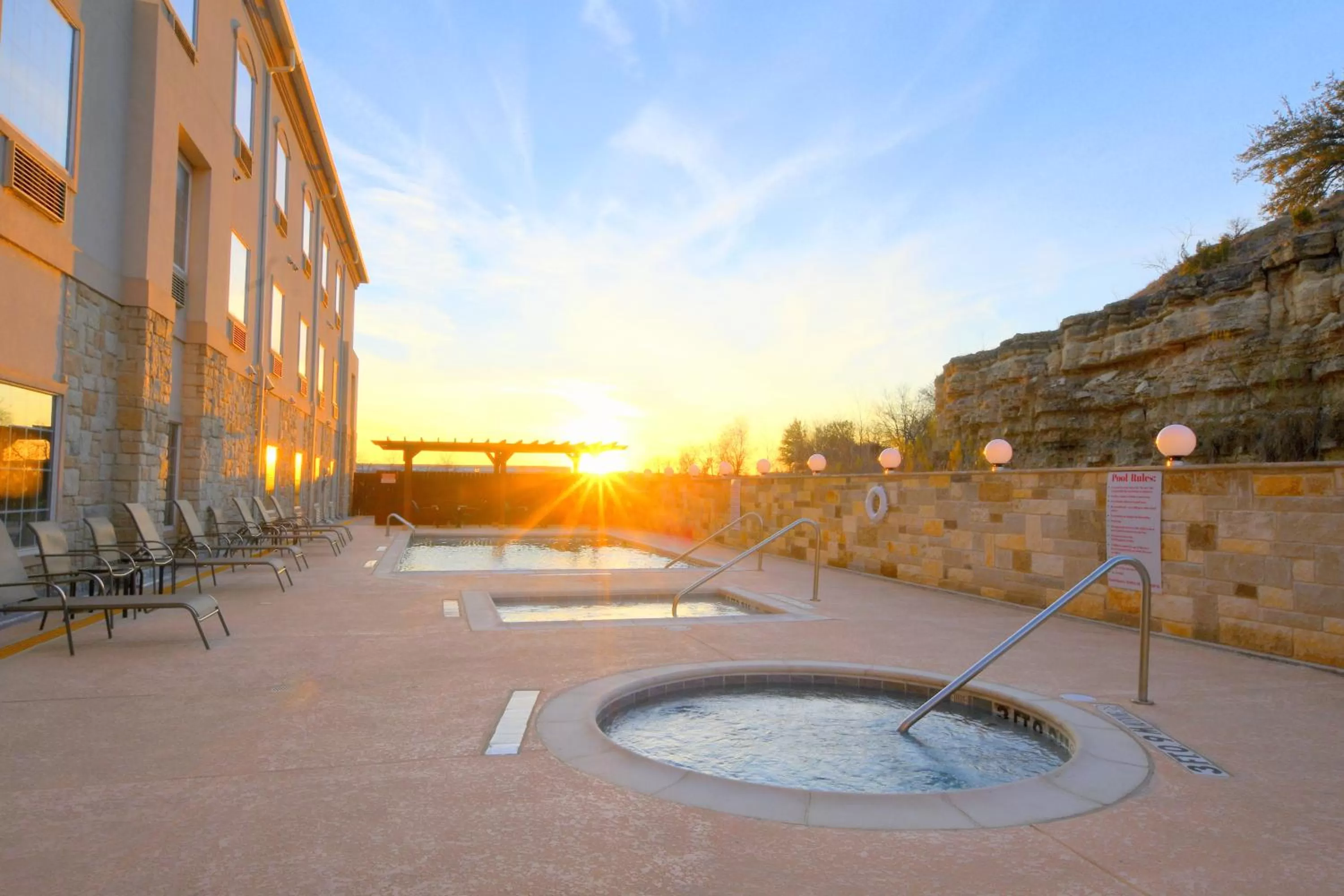 Swimming pool in Baymont Inn & Suites by Wyndham Glen Rose