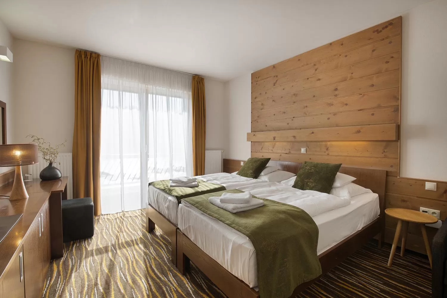 Bed in Equitana Hotel Resort