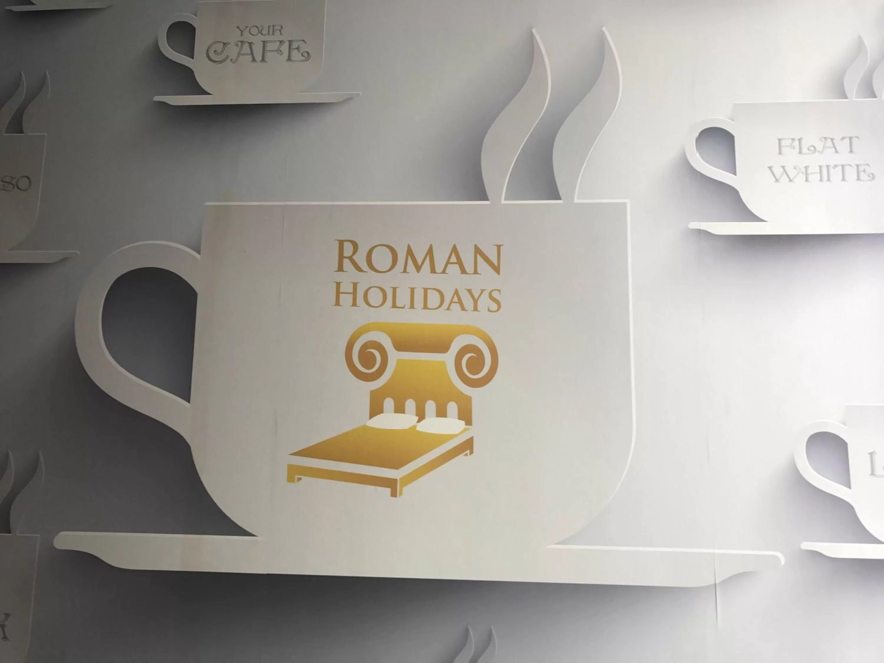 Property logo or sign in Roman Holidays Boutique Hotel