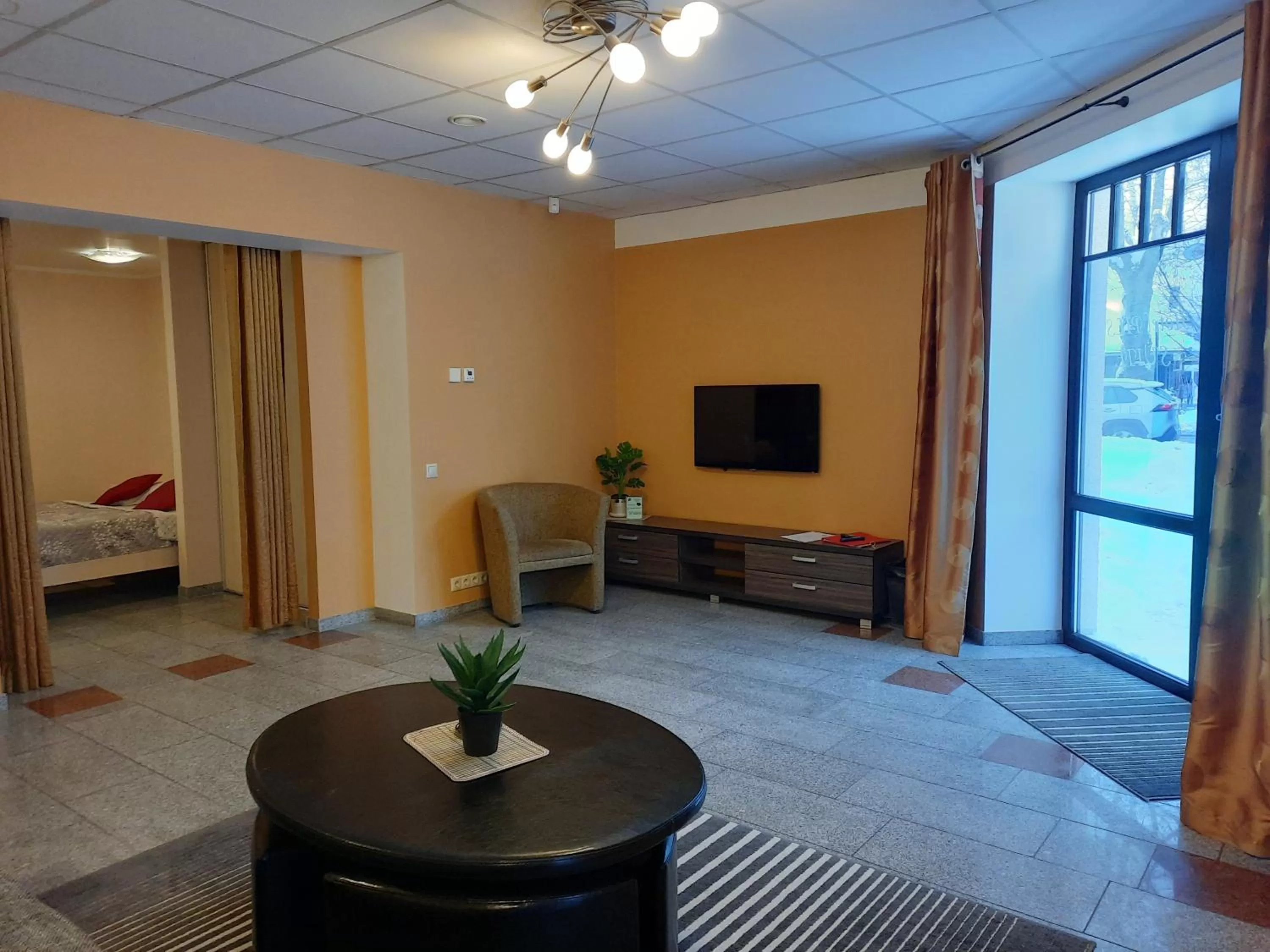 Living room, Bed in Hotel Pils with Self-Check in