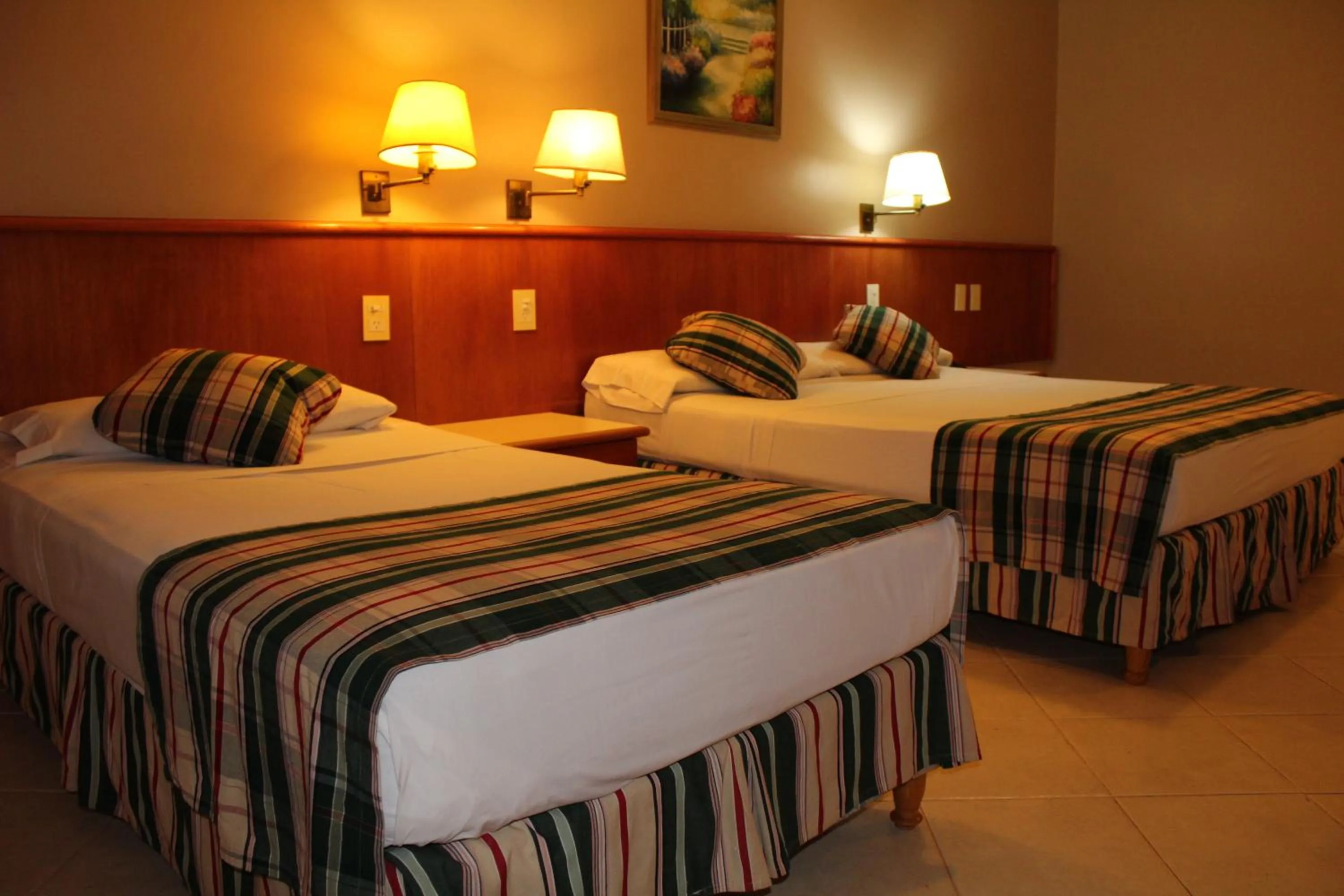 Photo of the whole room, Bed in Marcopolo Suites Iguazu