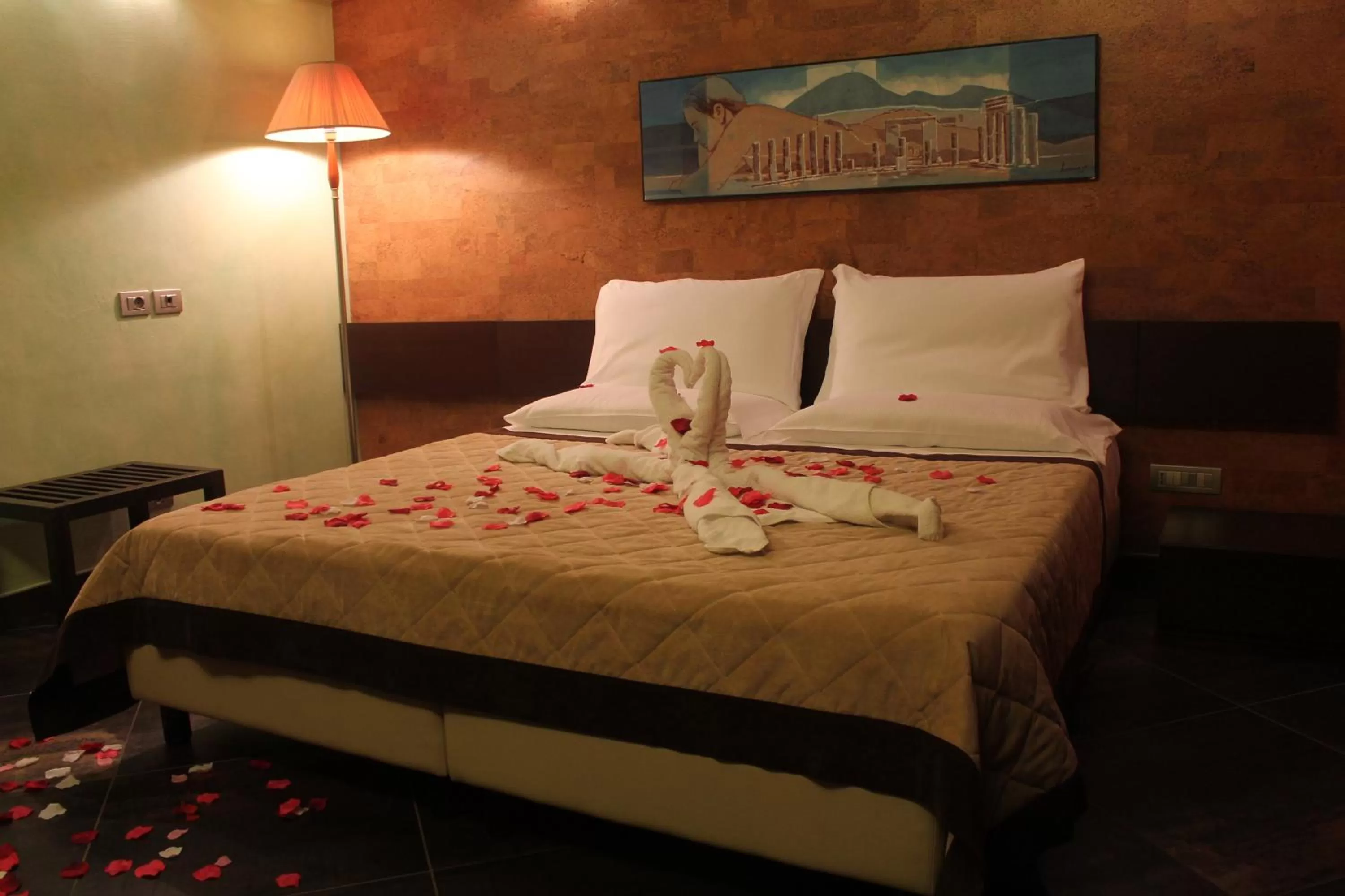 Bed in Abalon Pompei Resort