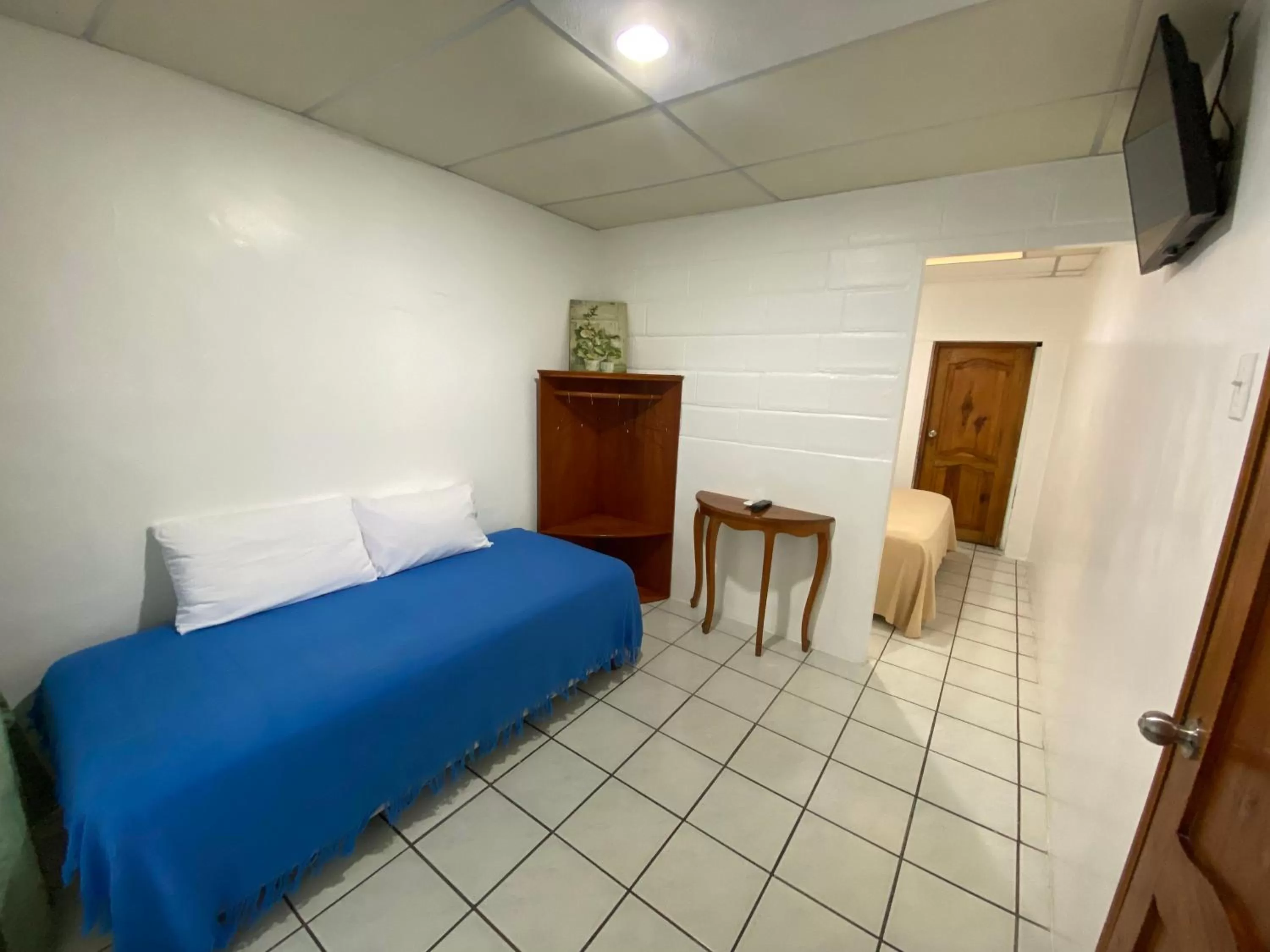 Bedroom, Seating Area in La Peregrina Galapagos B&B