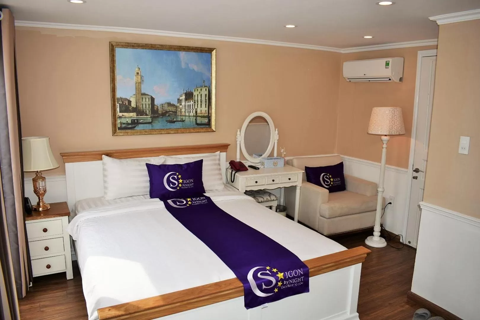 Bed in Saigon By Night Luxury Hotel