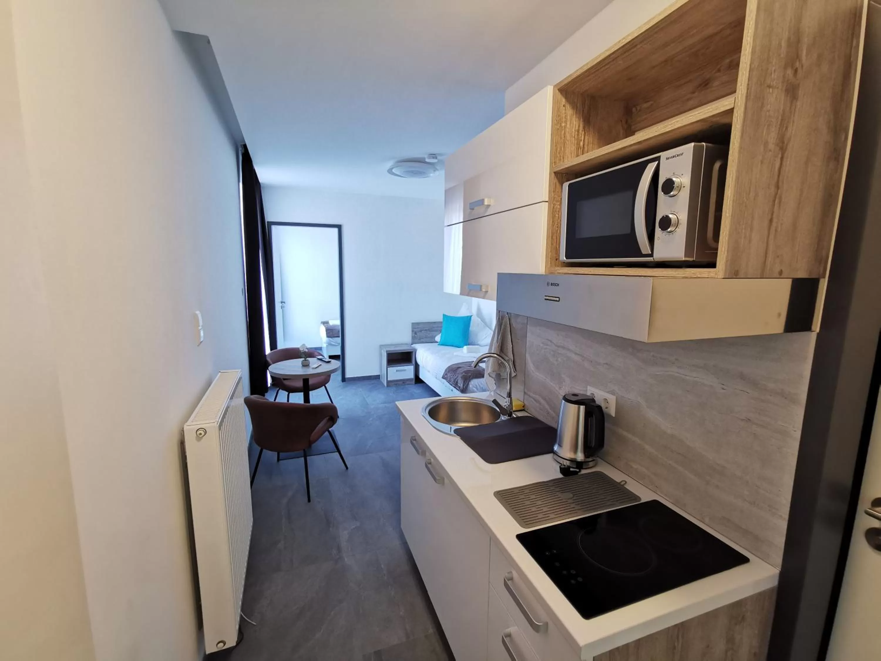 Kitchen or kitchenette in HP Apartments
